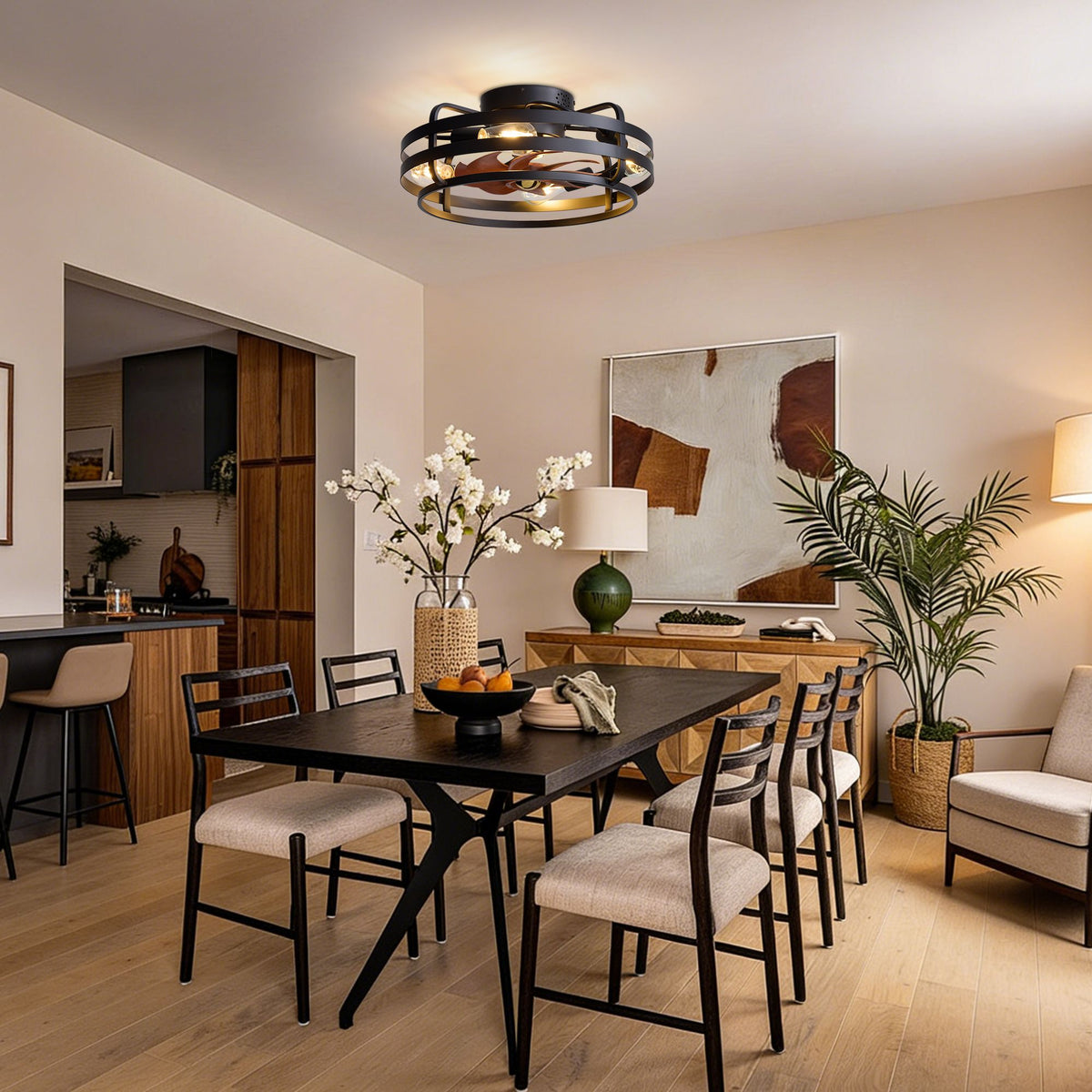 Black caged fandelier in dining room — dark wood table, upholstered chairs, modern art, warm farmhouse dining decor | Sofary Lighting