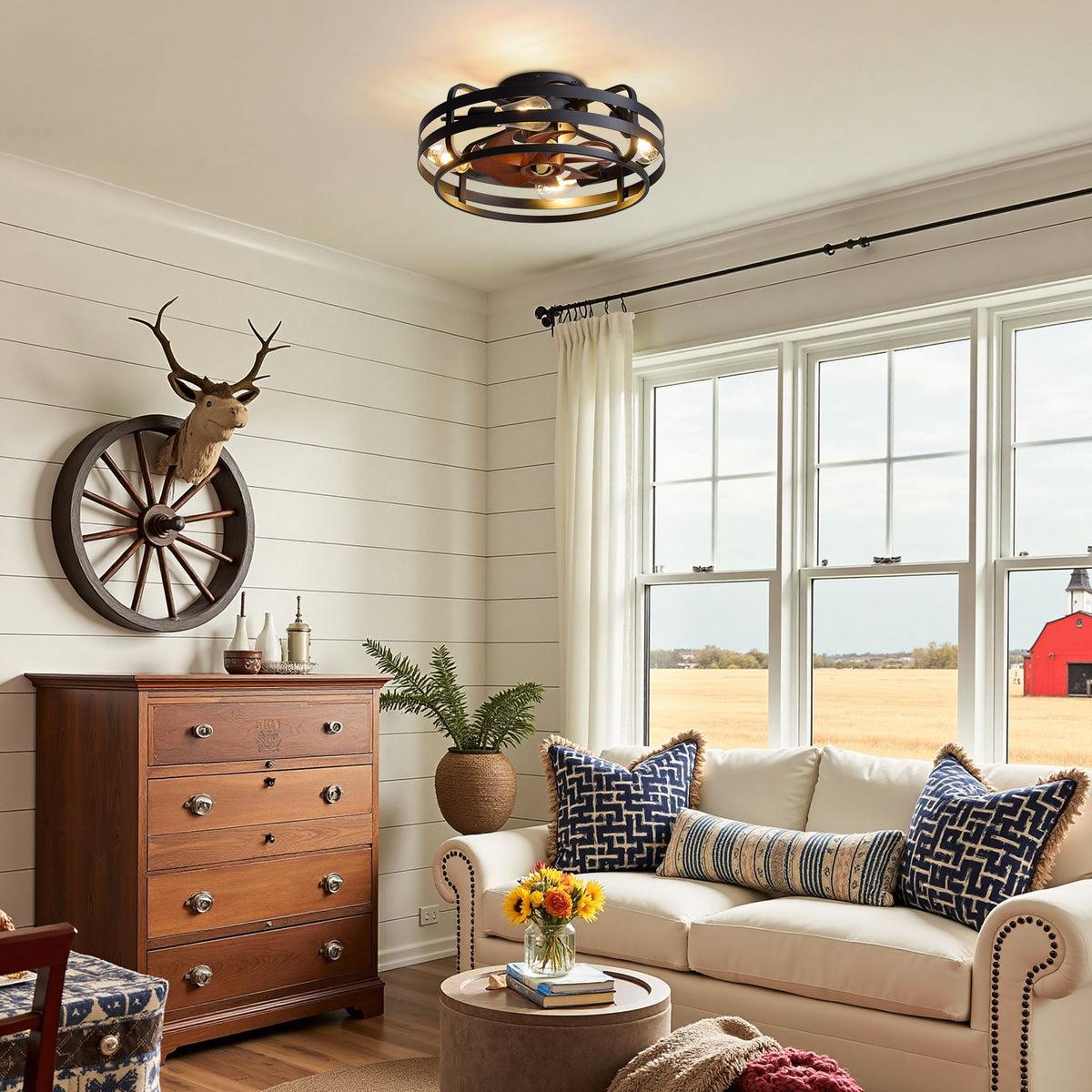 Rustic living room with black gold cage ceiling fan — deer antler decor, shiplap wall, beige sofa, cozy farmhouse style | Sofary Lighting