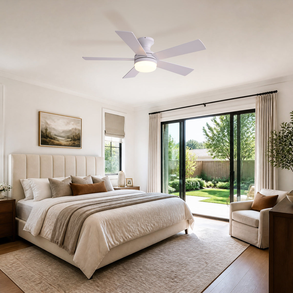 Modern ceiling fan in bedroom — beige tufted bed, sliding glass doors, warm neutral decor, quiet comfort | Sofary Lighting