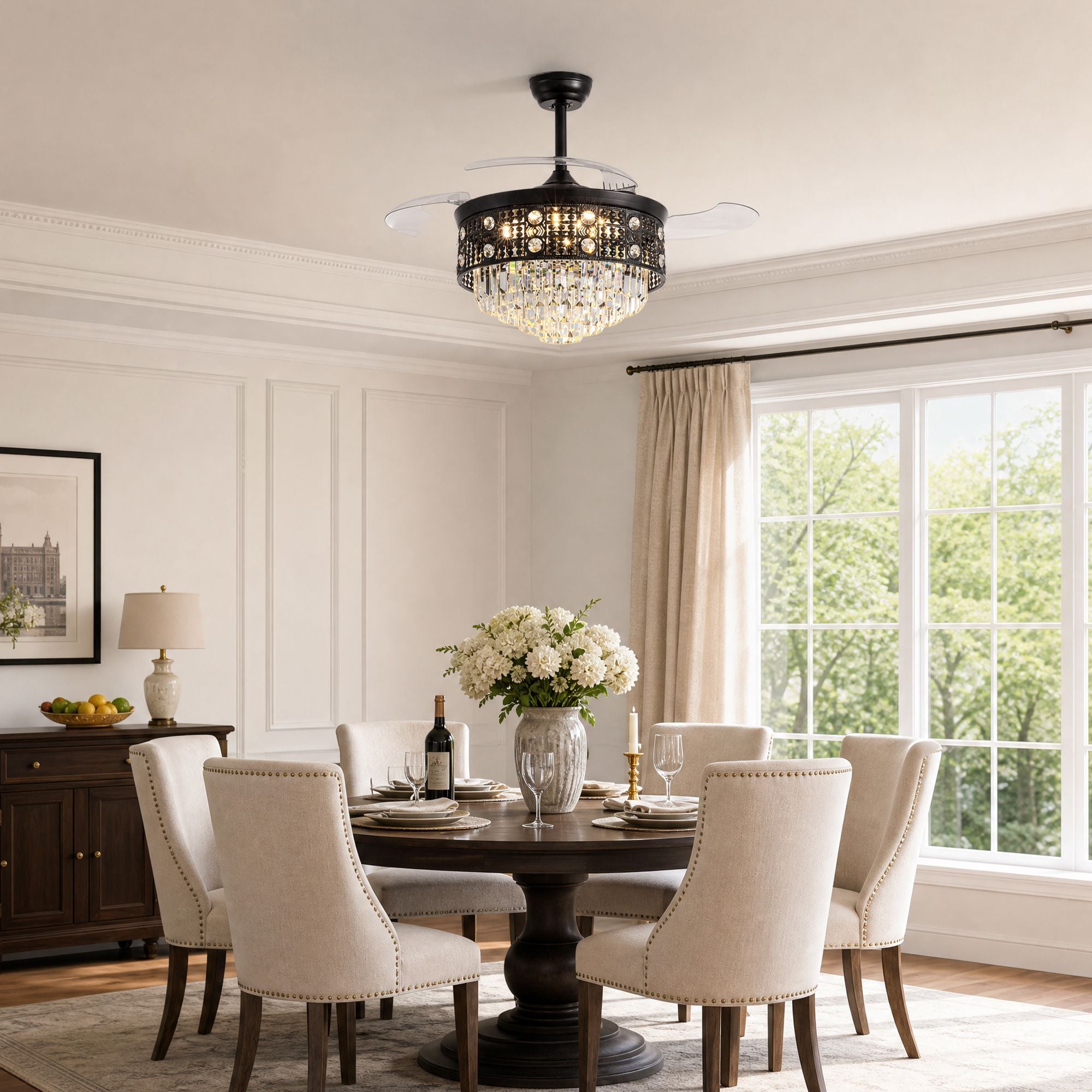 Black crystal retractable fan in elegant dining room — dark wood table, cream upholstered chairs, floral centerpiece, warm ambient lighting | Sofary Lighting