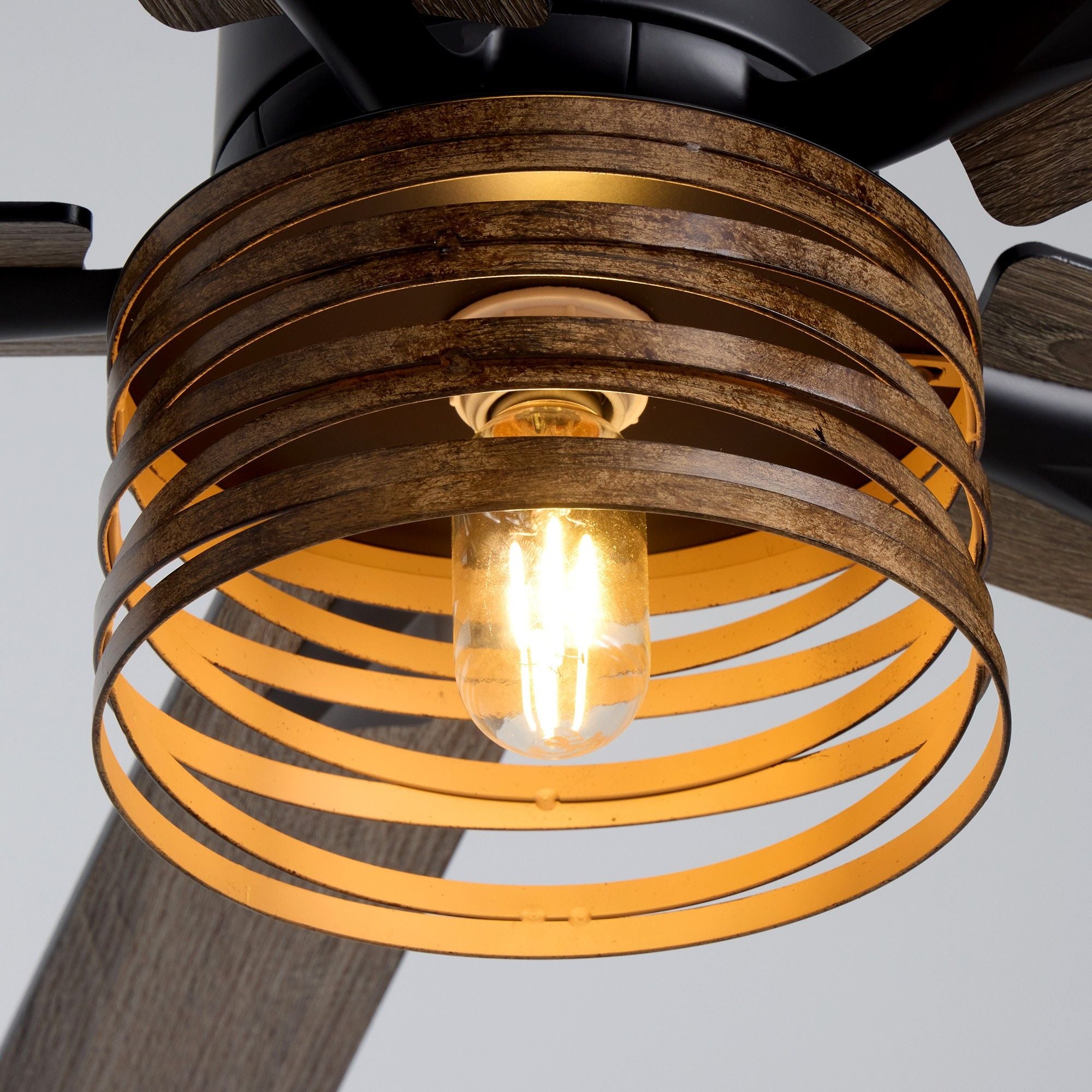 Close-up of amber ribbed glass light shade and black motor housing — vintage Edison bulb glow, gold interior reflector, industrial farmhouse craftsmanship | Sofary Lighting