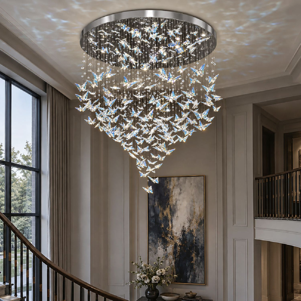 Aeris Modern Butterfly Crystal Chandelier — cascading K9 crystal butterflies, gold metal frame, warm LED glow, luxury double-height foyer with staircase | Sofary Lighting