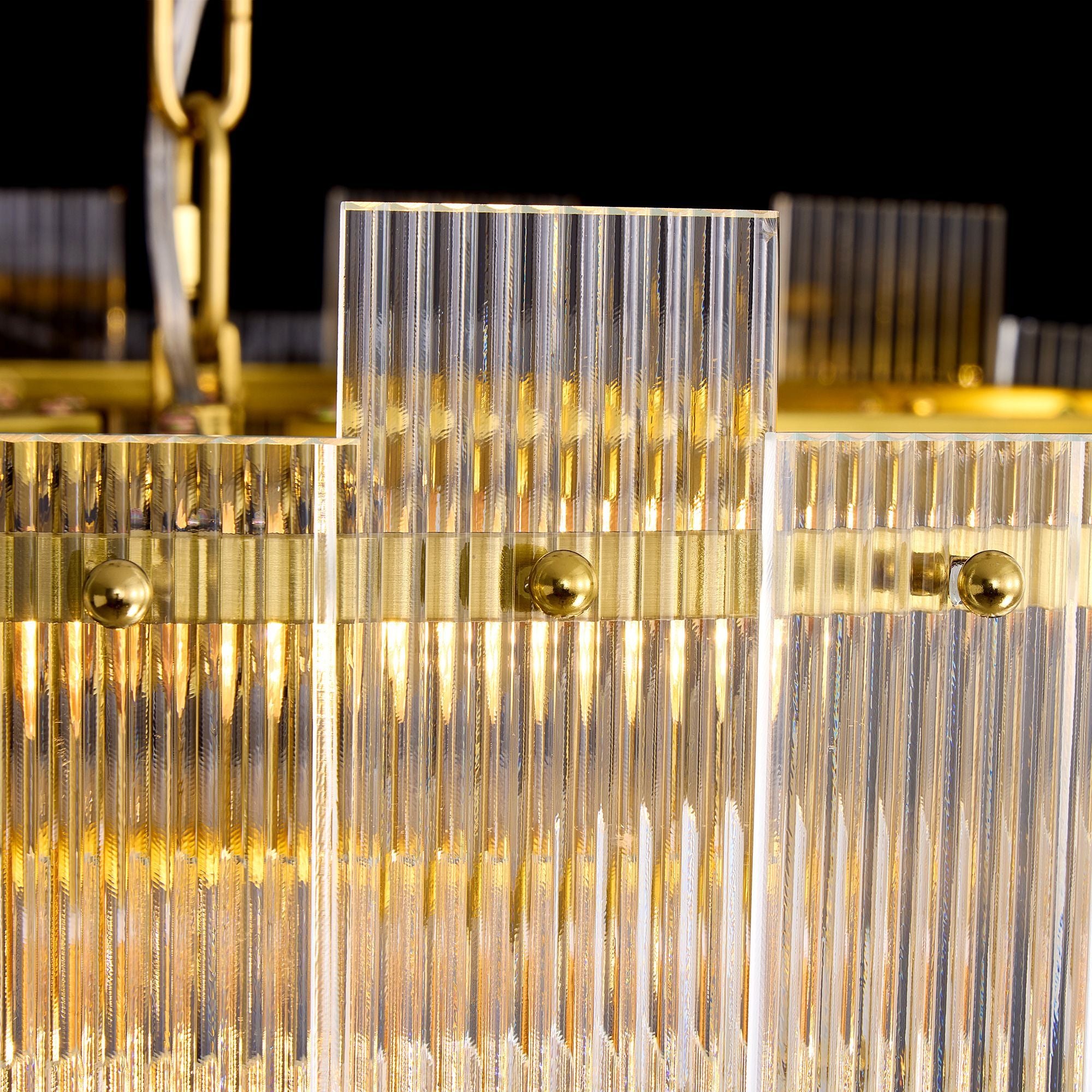 Close-up of Aerosel Chandelier — ribbed glass tubes, polished brass fasteners, light refraction, premium craftsmanship | Sofary Lighting