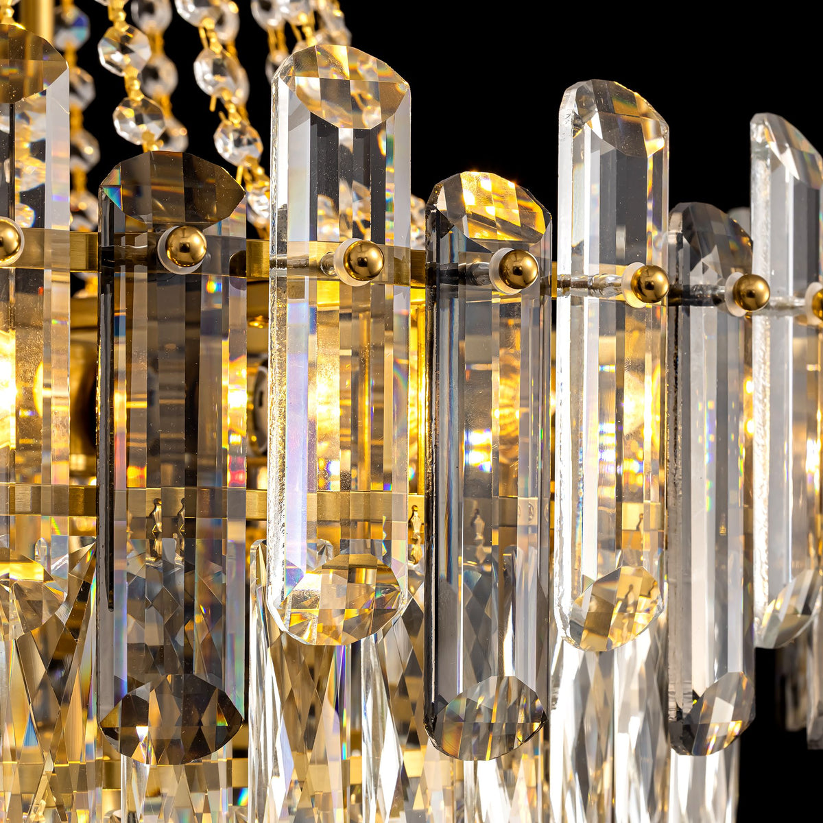 Close-up of Aerospect Chandelier — clear and smoky K9 crystal rods and beads, gold metal frame, light refraction and iridescent sparkle, black background, premium detail | Sofary Lighting