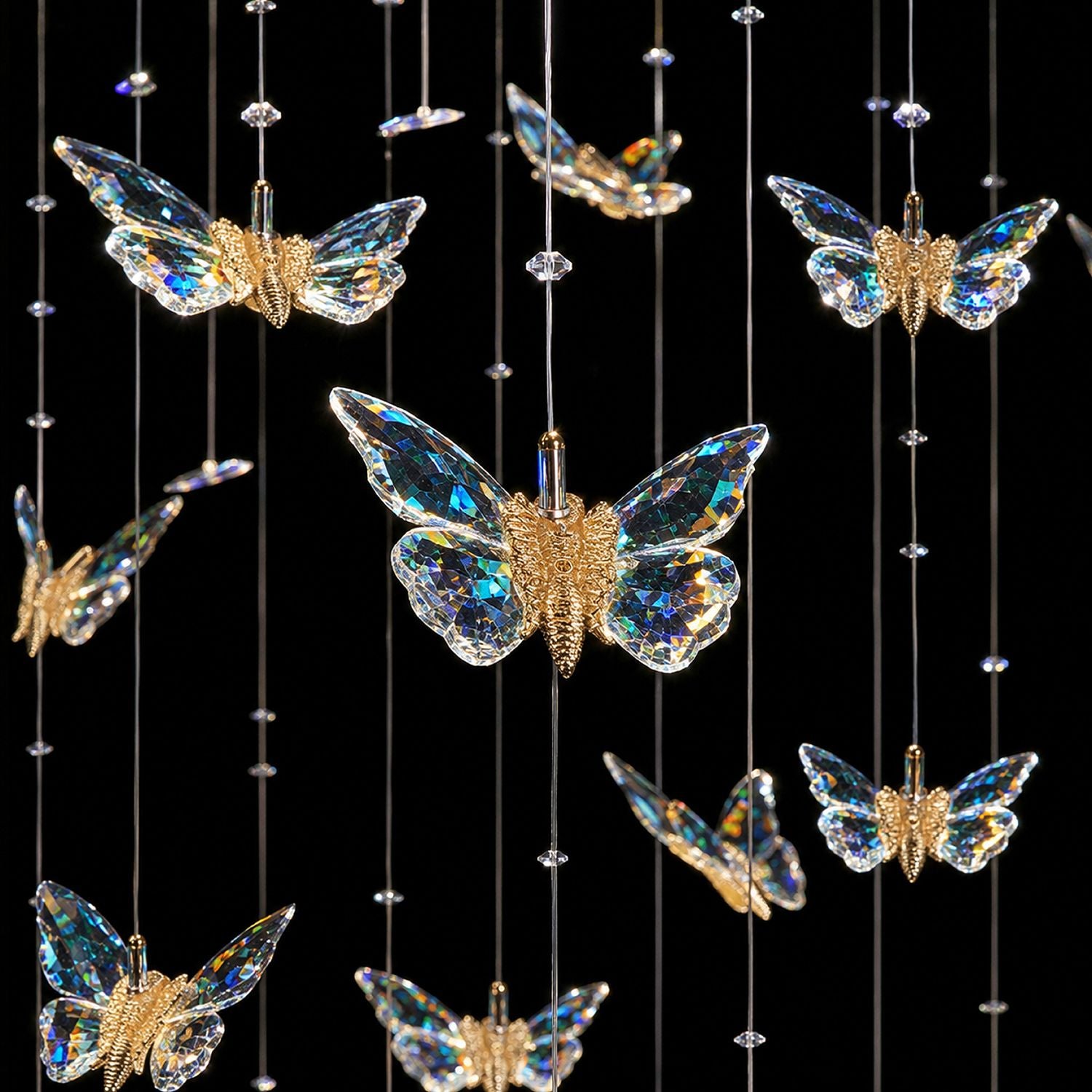 Close-up of Aerosus Crystal Butterfly Chandelier — iridescent K9 prisms, gold-tone metal body, delicate wing structure, capturing light from every angle | Sofary Lighting