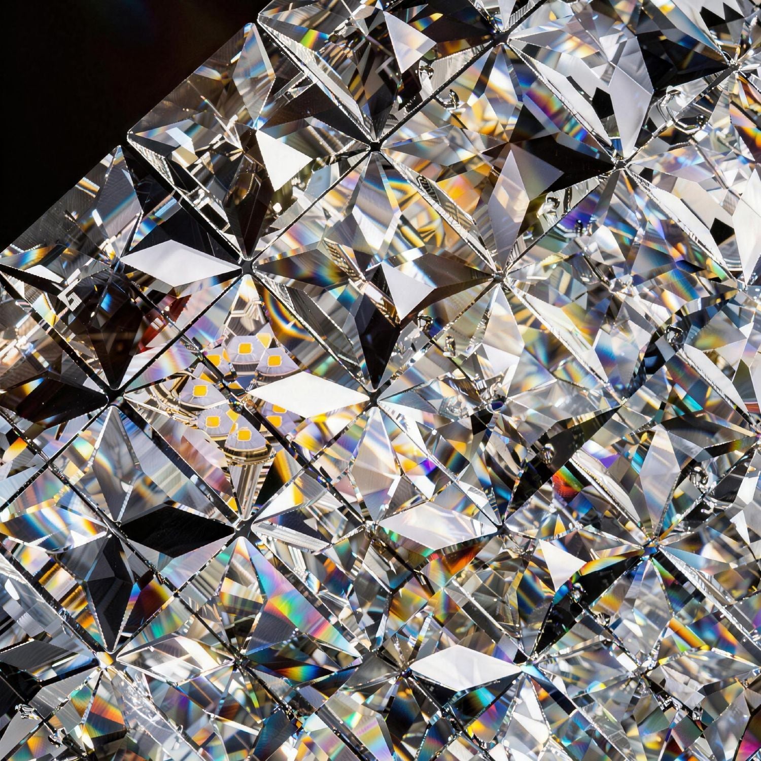 Closeup of Aria Post-Modern Champagne Gold K9 Crystal Linear Three-Color Dimming Chandelier — showcasing intricate faceted crystal cuts, rainbow light refraction, and premium K9 craftsmanship | Sofary Lighting
