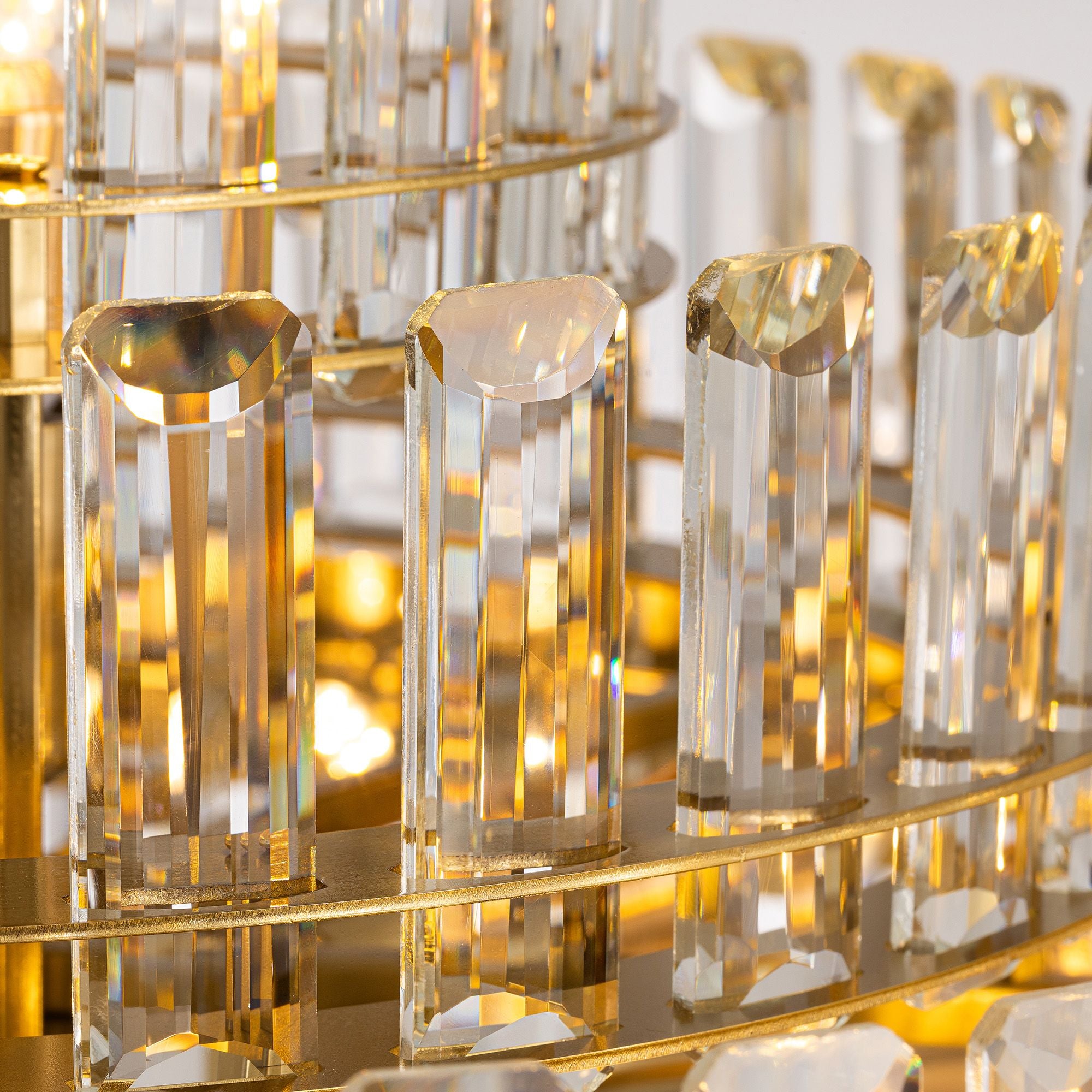 Macro detail of Aureole’s raindrop crystals — faceted K9 prism edges, copper-gold hardware, brilliant light refraction and sparkle | Sofary Lighting