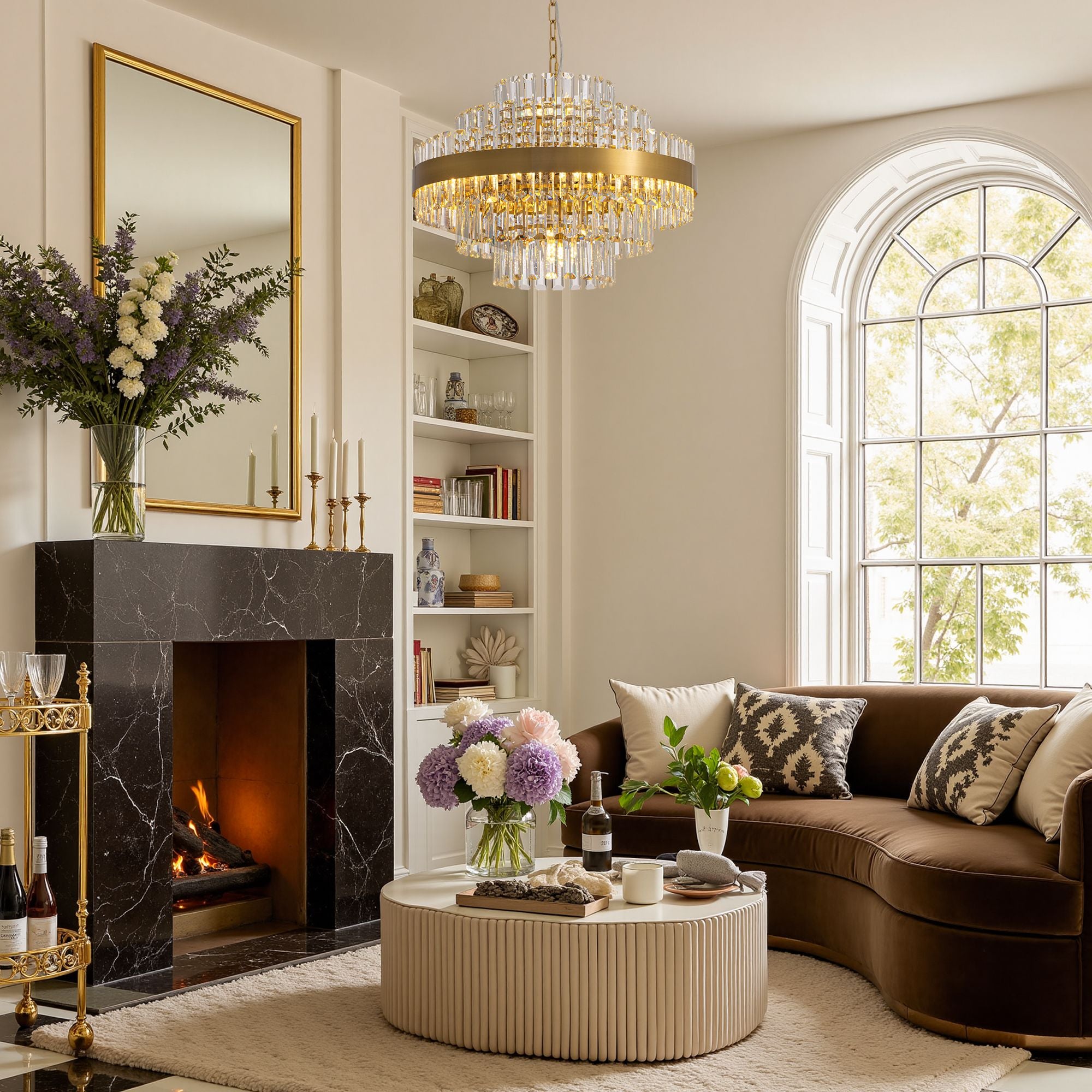 Aureole Round Raindrop Chandelier in living room — arched window, marble fireplace, curved sofa, sparkling crystal light refraction | Sofary Lighting