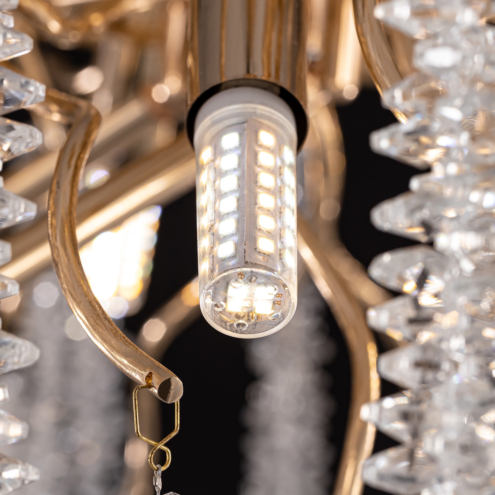 avelisse-modern-luxury-gold-crystal-branch-linear-chandelier-crystal-details-of-bulb-sofary-lighting