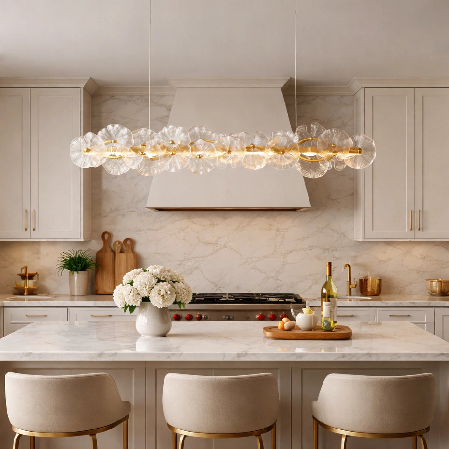 Luxury kitchen island lighting featuring the Contemporary Linear Glass Flower Chandelier over a white marble countertop and light cabinetry. Sofary Lighting