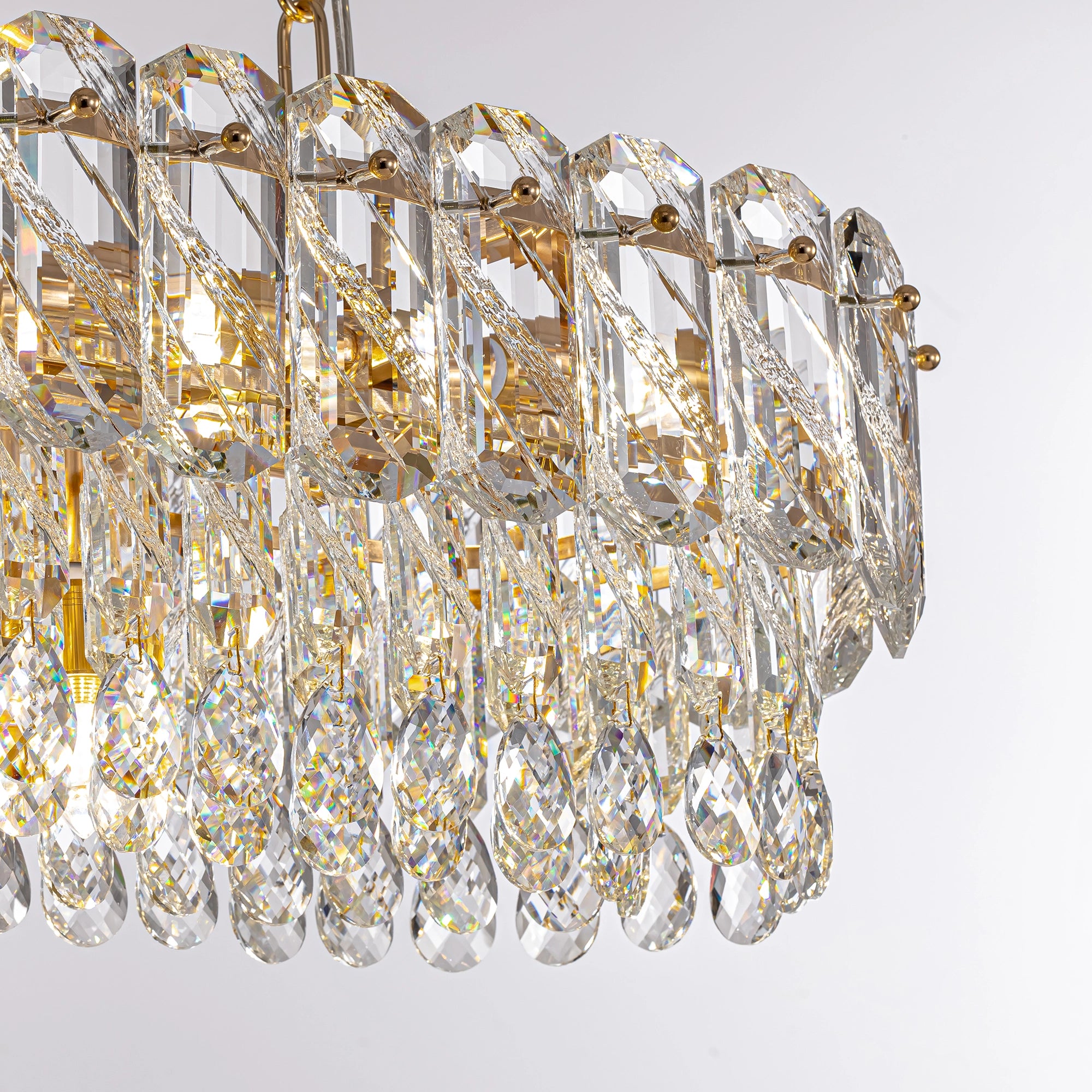 close-up-of-elara-gold-crystal-rectangular-chandelier-sofary-lighting
