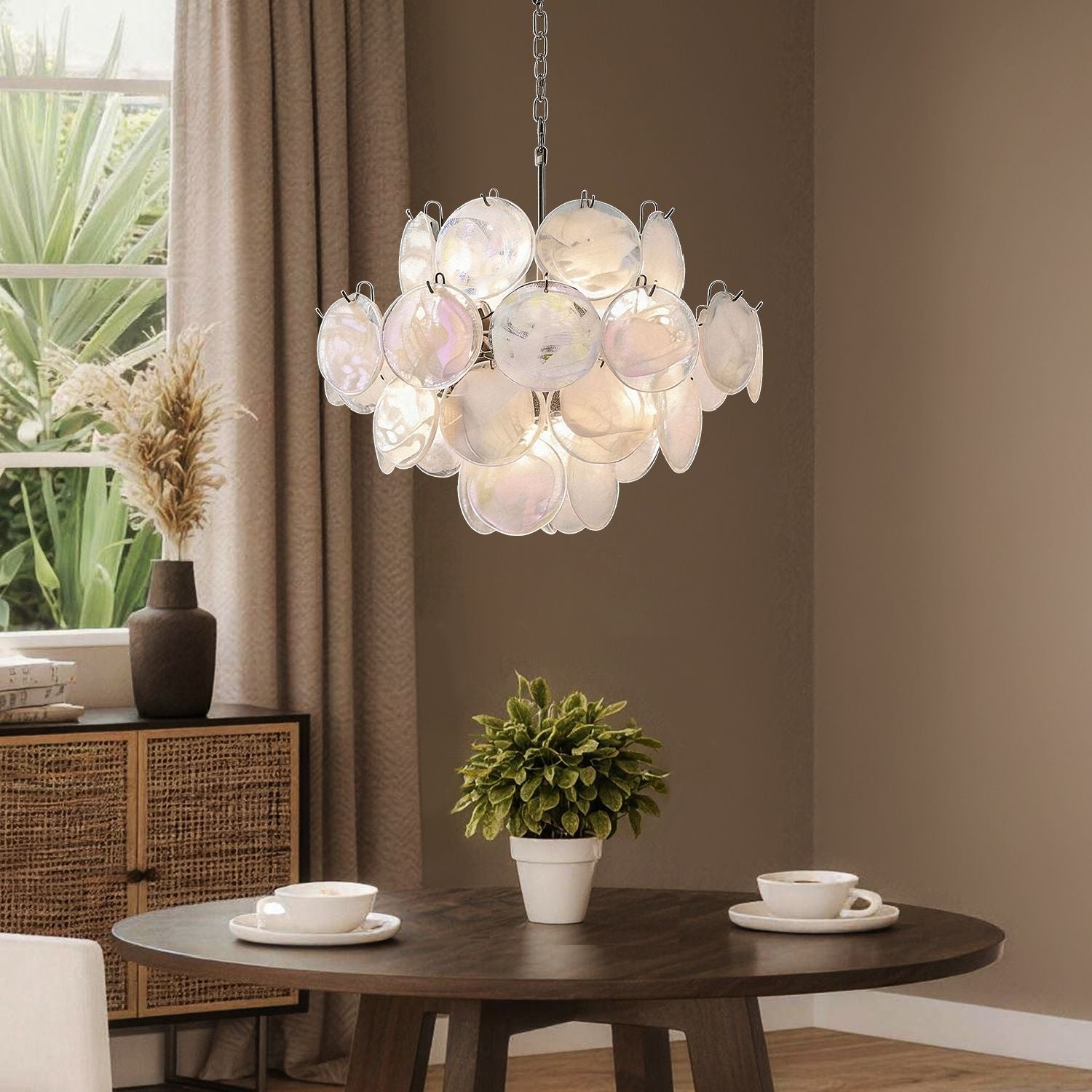 Luna Artistic Nordic Moonlight White Acrylic Petal Three-Color Eye-Care Chandelier casting warm, eye-caring glow over a beautifully set dining table with floral centerpiece and fine dinnerware | Sofary Lighting