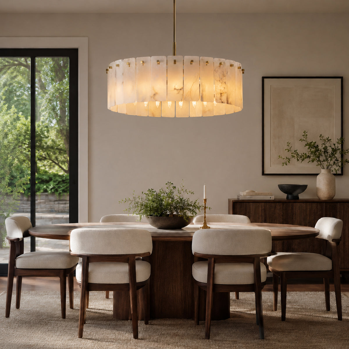 lunareth-modern-luxury-gold-alabaster-drum-chandelier-above-dining-room-sofary-lighting