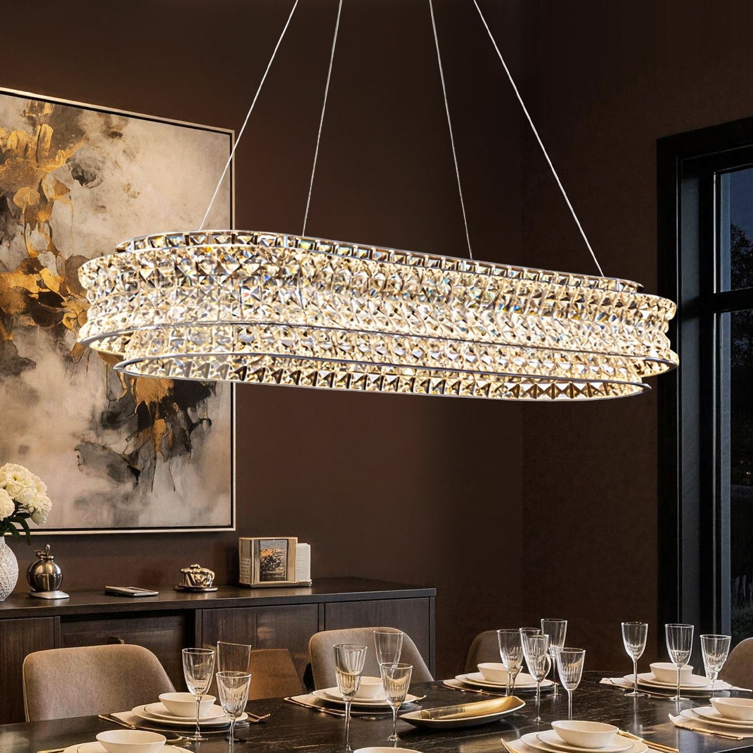 modern champagne gold k9 crystal glacial ripple chandelier above dining table in luxury dark tone dining room | Sofary Lighting