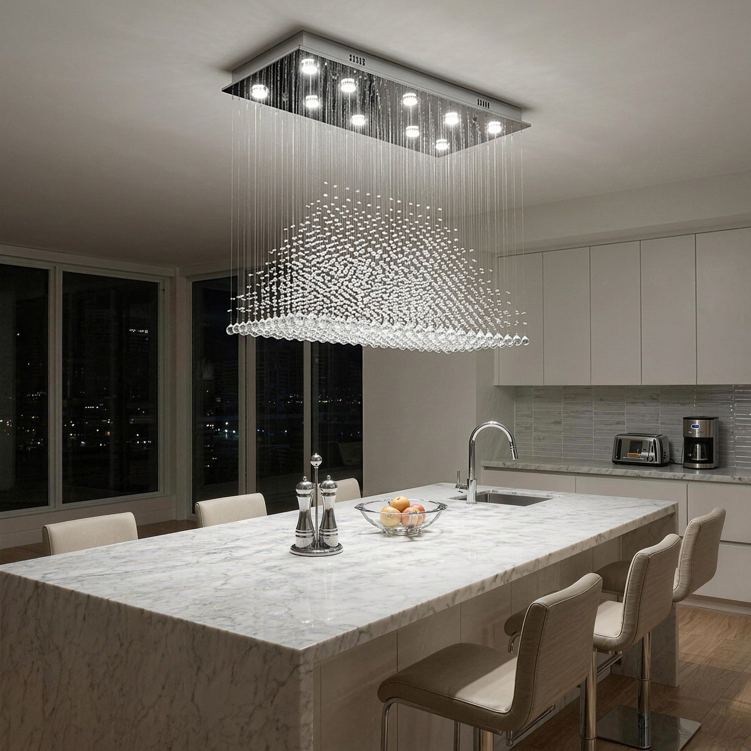 rectangular k9 crystal chandelier lighting up modern kitchen island at night | Sofary Lighting
