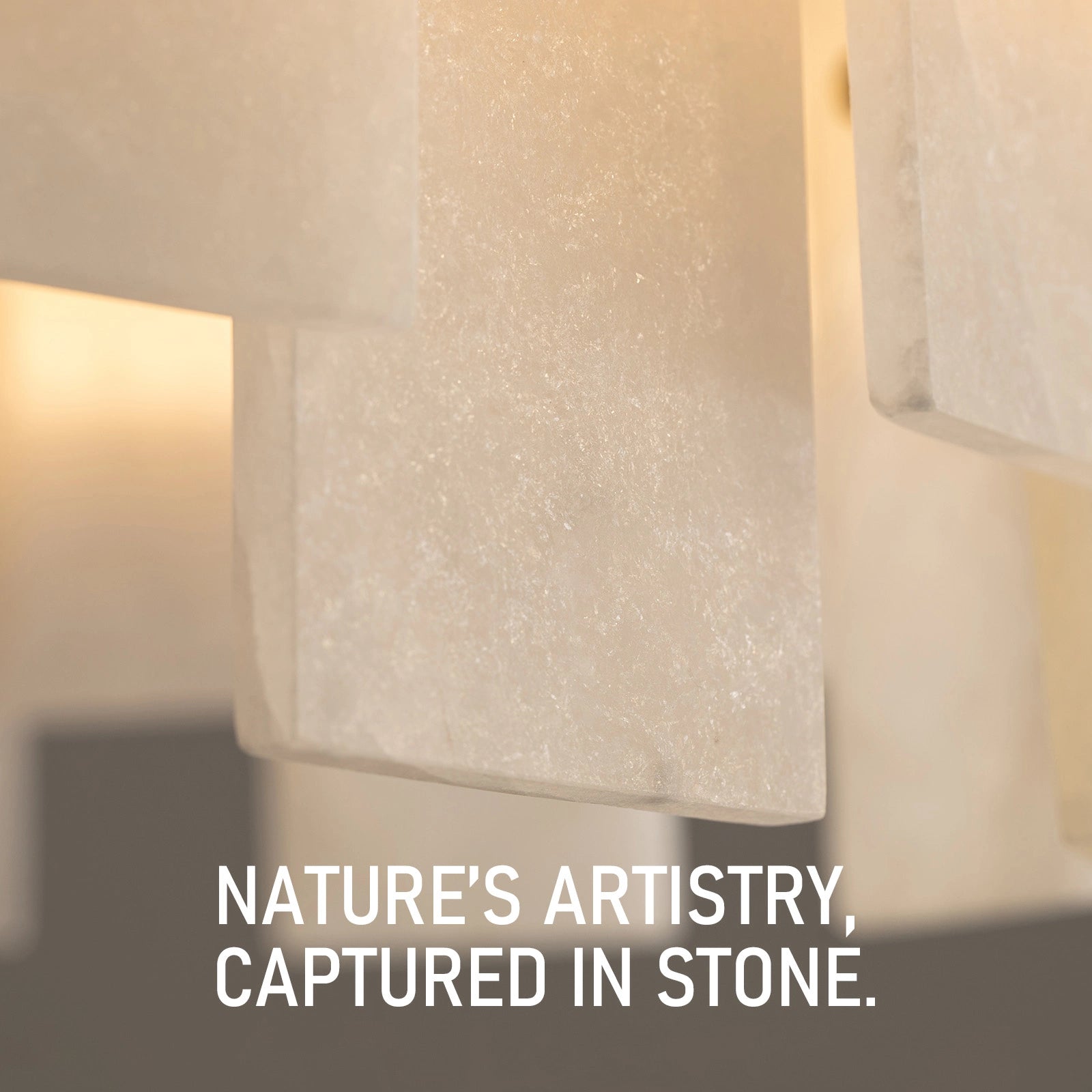 close-up-of-modern-round-alabaster-gold-chandelier-with-circular-gold-frame-and-evenly-spaced-alabaster-panels-emitting-warm-light-sofary-lighting