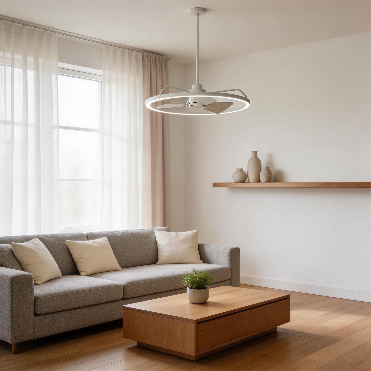 white modern ceiling fan with led light ring installed in minimalist living room