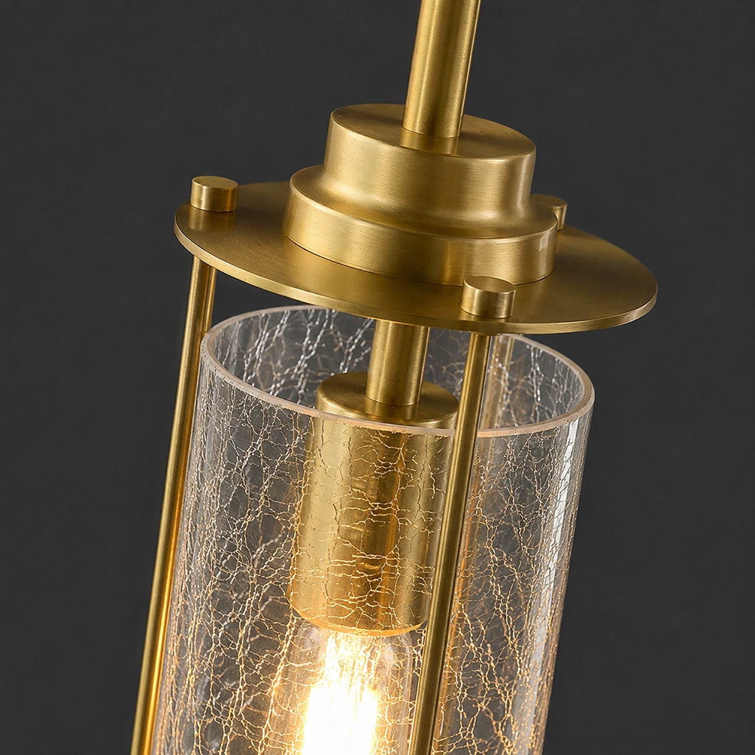 Close-up of Novera Chandelier — hand-blown crackle-textured glass globes, brushed brass stems, exposed filament bulb — showcasing artisan quality and material depth | Sofary Lighting
