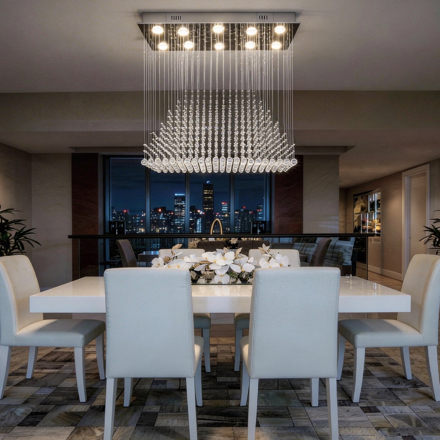 modern rectangular k9 crystal chandelier illuminating dining room at night with city view | Sofary Lighting