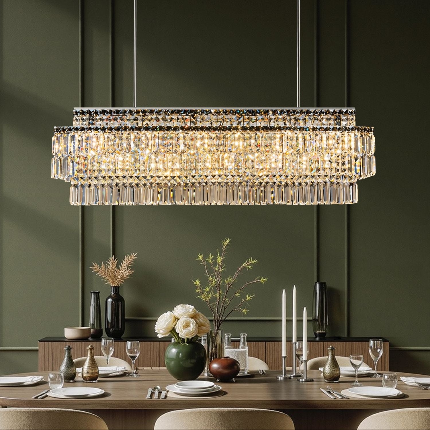 Stellar Grand Linear Silver Multi-Faceted K9 Crystal Chandelier in a dining room — hanging above a marble table with white flowers, elegant tableware, and a dark paneled wall backdrop | Sofary Lighting
