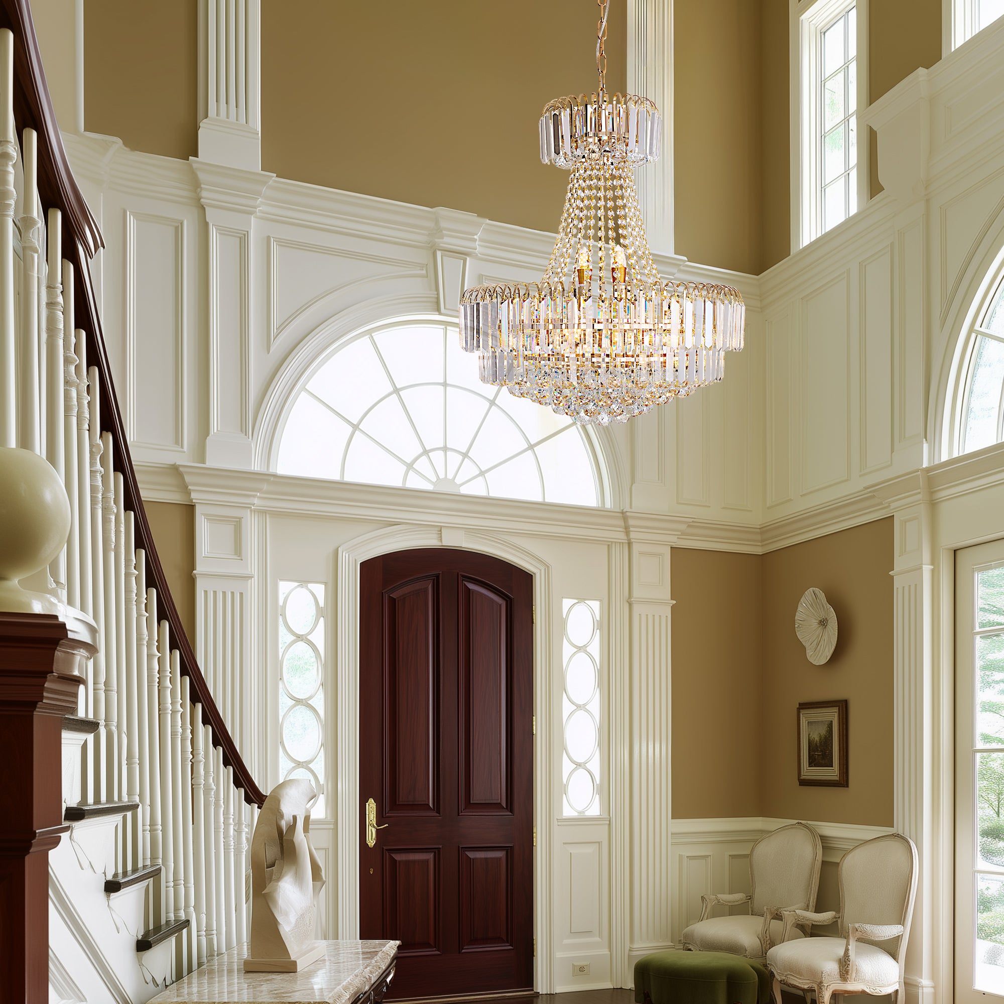 Valerisse gold crystal tiered empire chandelier in a tall foyer