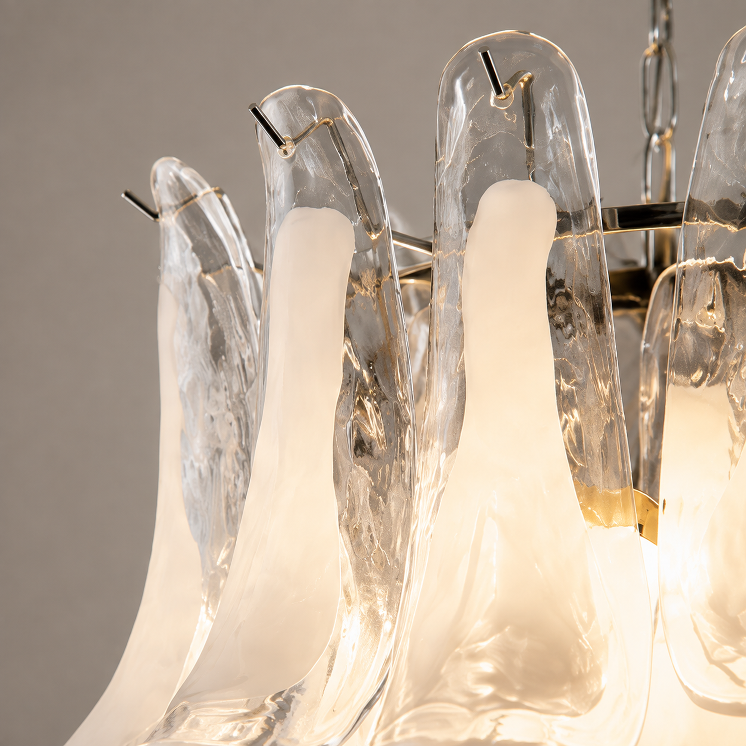 Close-up of Veloria hand-formed clear and opal glass petals