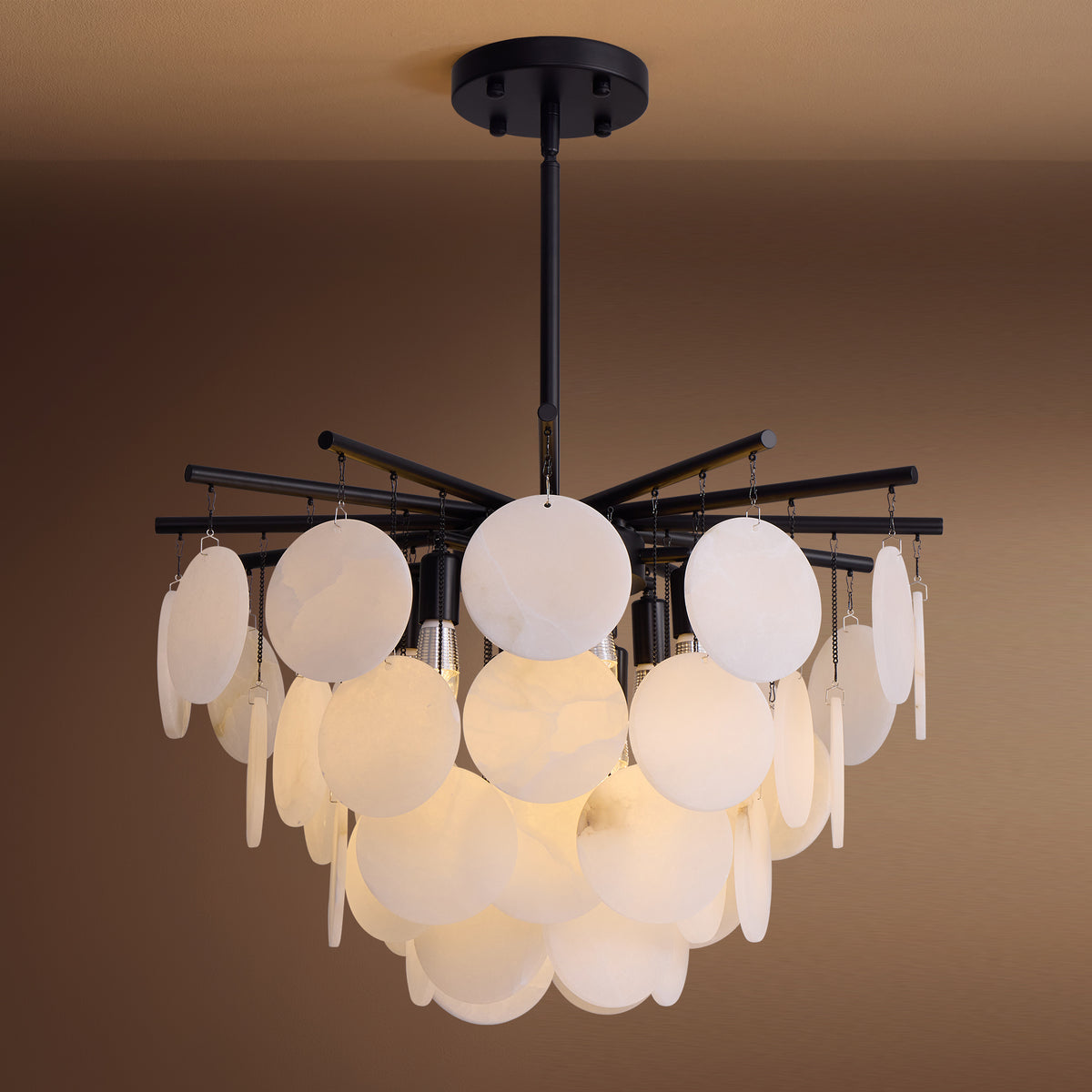 vessara-modern-organic-alabaster-disc-chandelier-brown-backgropund-sofary-lighting
