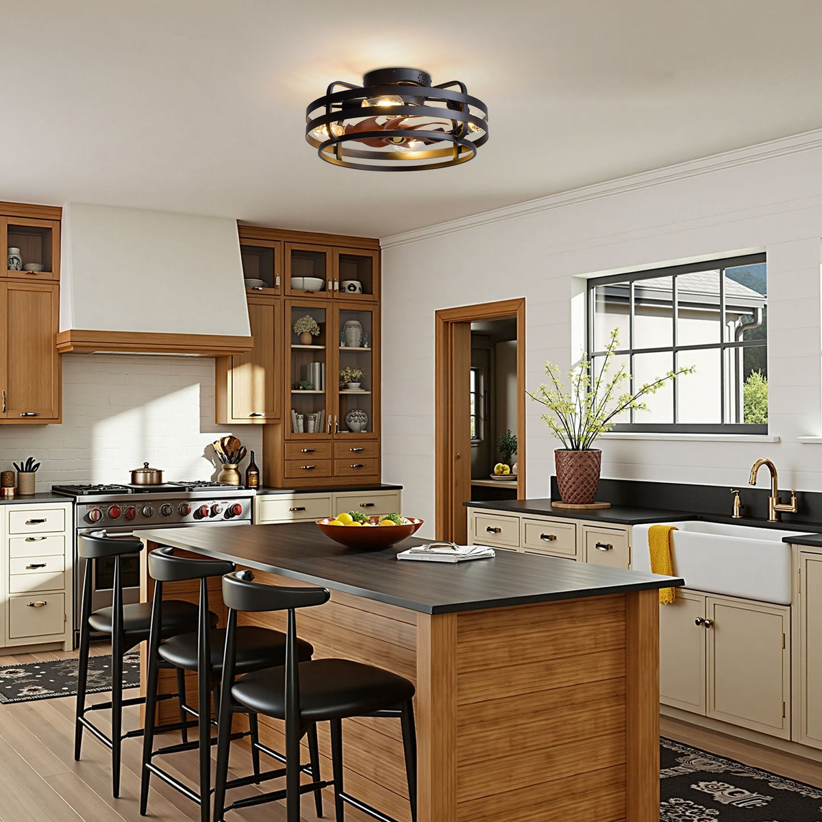 Farmhouse kitchen island lighting — black caged ceiling fan, wood cabinetry, dark countertop, bar stools, rustic kitchen decor | Sofary Lighting
