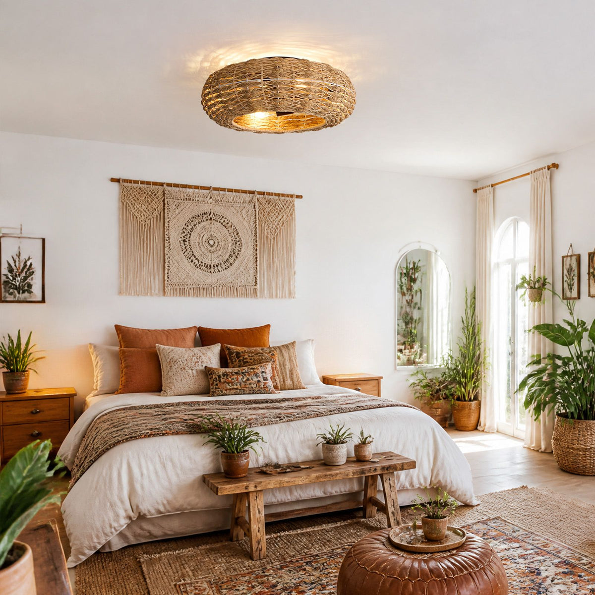 Boho rattan ceiling fan in bedroom — macrame wall hanging, wooden bench, plants, warm cozy decor, woven flush mount fan with light | Sofary Lighting