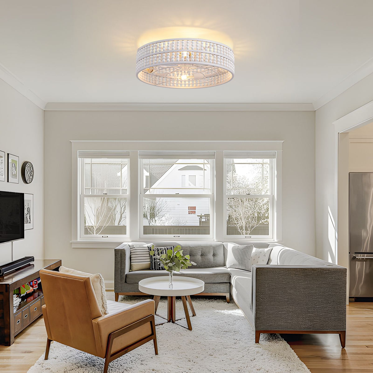 Boho white beaded fandelier in living room — gray sofa, modern farmhouse decor, bright windows, cozy elegant space | Sofary Lighting