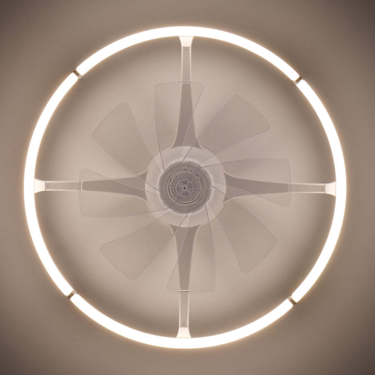 Top-down view of 23.6" white foldable ceiling fan — glowing LED light ring, transparent acrylic blades extended, white round housing, central motor, flush mount ceiling | Sofary Lighting