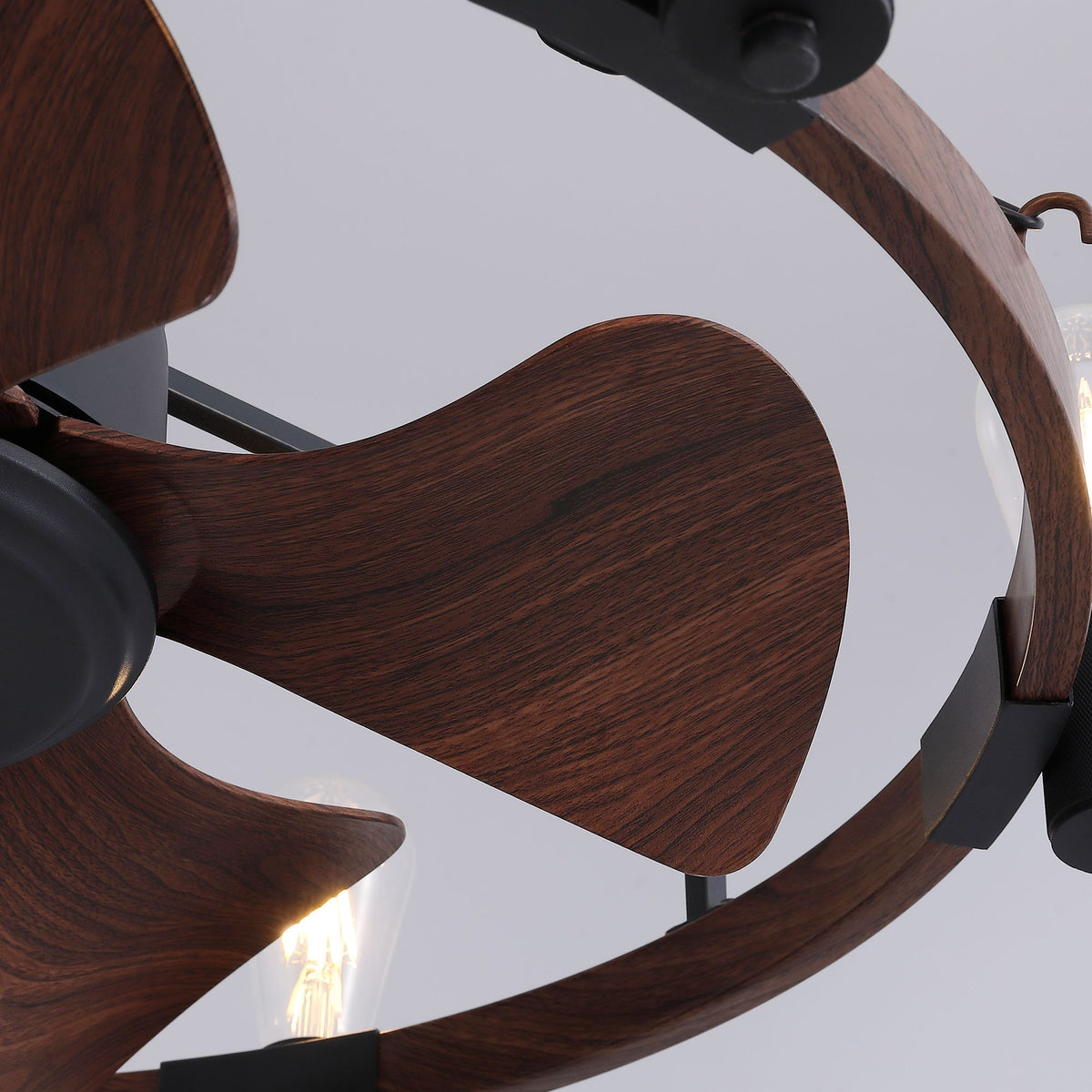Close-up of wood grain blades — 28.3" farmhouse wagon wheel fandelier, rustic walnut finish, black metal cage, exposed bulb | Sofary Lighting
