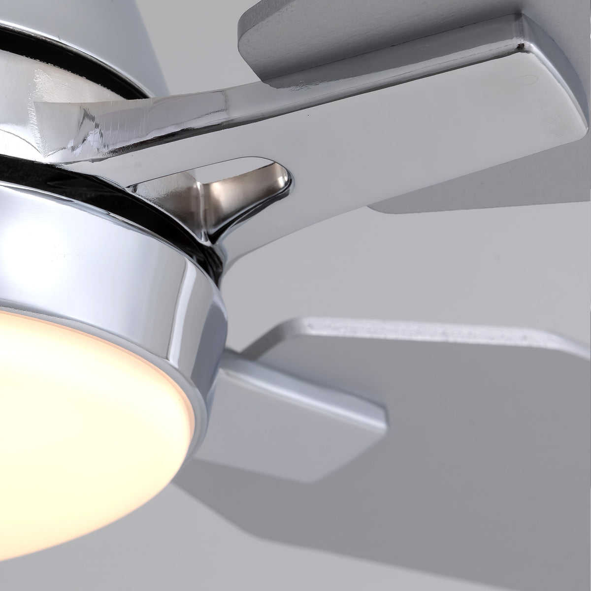Chrome motor housing and LED light detail — fandelier, polished silver finish, warm glowing diffuser, premium craftsmanship | Sofary Lighting
