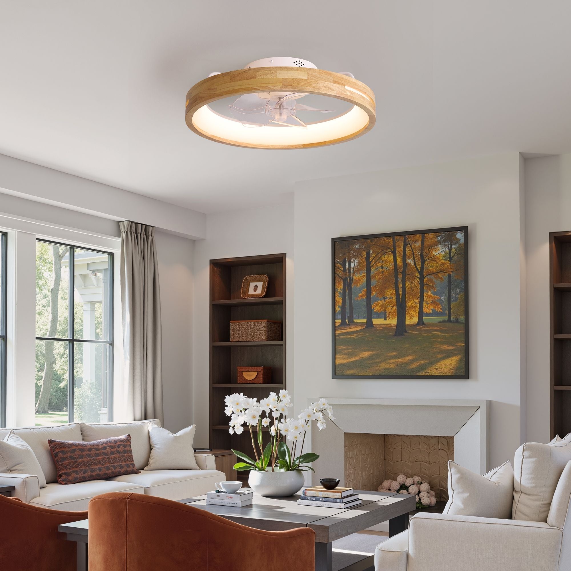 Aeria Flush Mount Ceiling Fan in cozy living room — white sofa, fireplace, bookshelf, autumn wall art, soft natural light through windows | Sofary Lighting