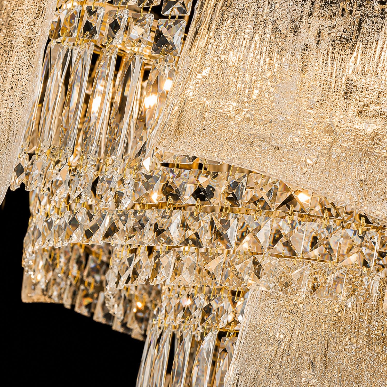 Close-up of Aeria Chandelier’s Grade-A crystal prisms — hand-cut facets refract light beautifully, gold-toned metal frame adds modern neoclassical sophistication