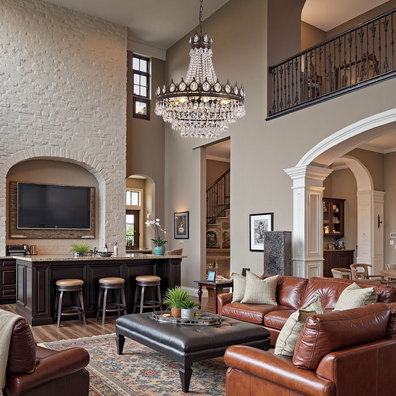 Aerian K9 Chandelier in luxury living room — double-height ceiling, brick accent wall, leather sofa, home bar, grand staircase, sparkling crystal glow | Sofary Lighting