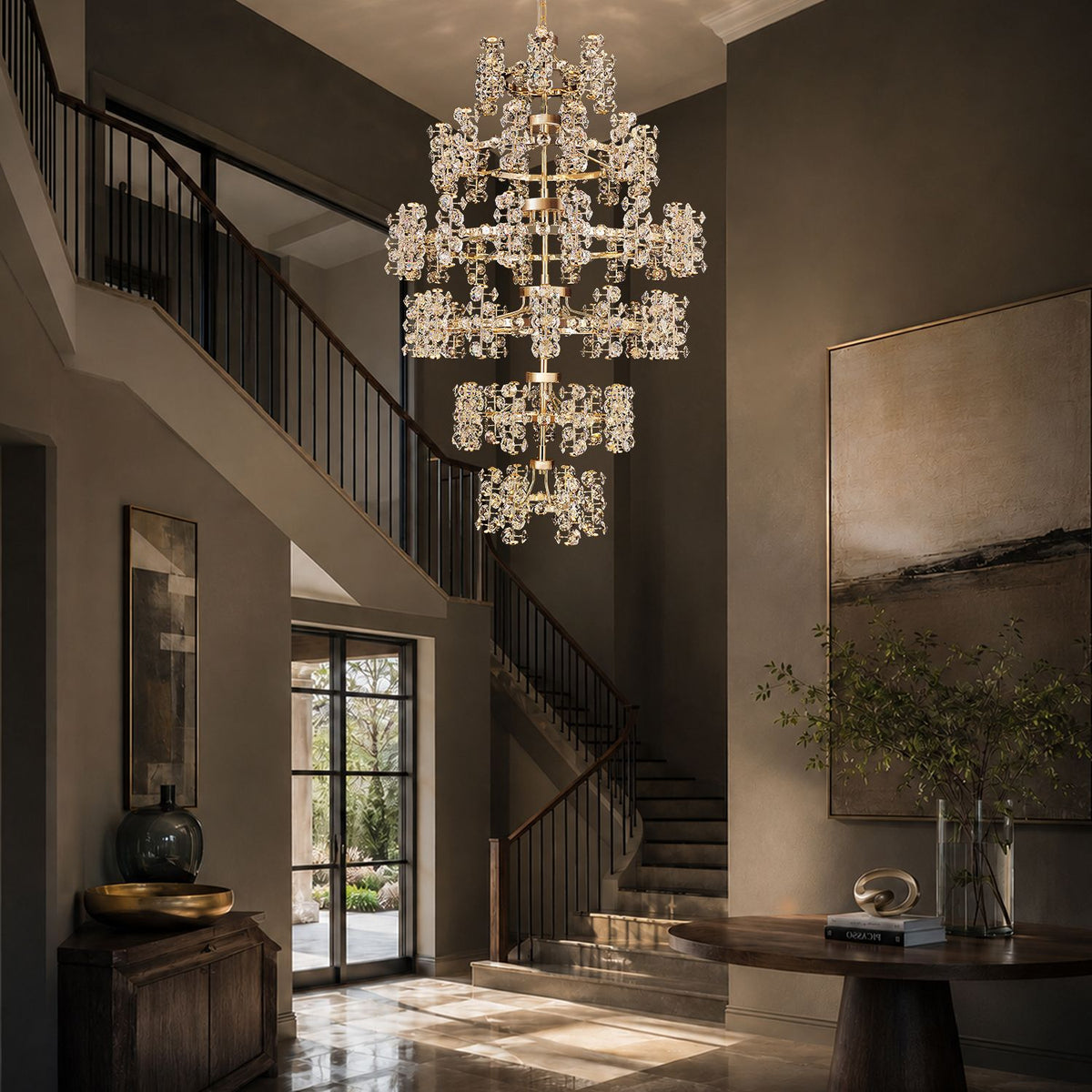Aeriol Crystal Chandelier in grand foyer — wood-paneled walls, wrought iron railing, console table with decor, arched doorway, sparkling K9 crystal waterfall as centerpiece | Sofary Lighting