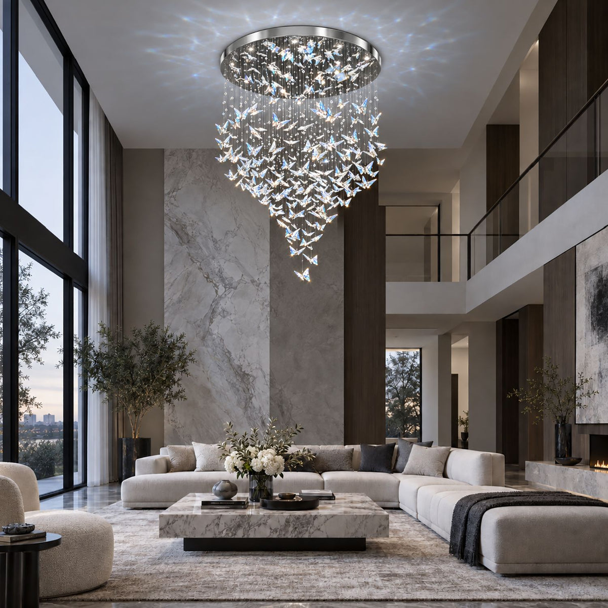 Aeris Butterfly Chandelier in double-height living room — stone fireplace, L-sofa, tall windows, cascading crystal wings, luxury natural light | Sofary Lighting