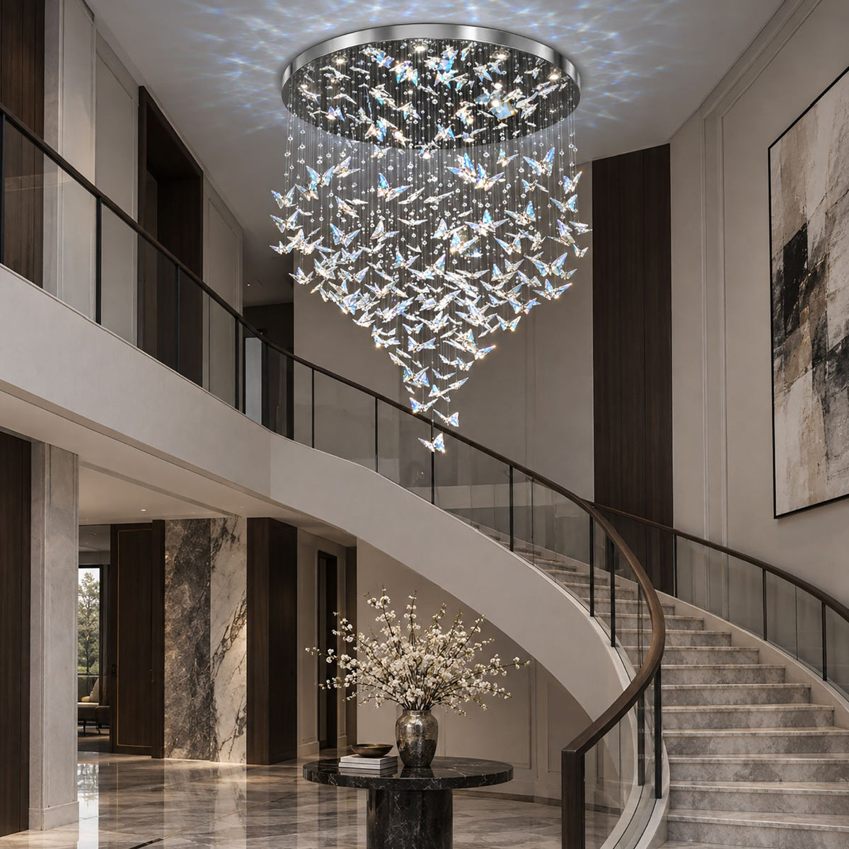 Aeris Butterfly Crystal Chandelier over curved staircase — black railings, second-floor balcony, floating crystal butterflies, dramatic mansion interior | Sofary Lighting