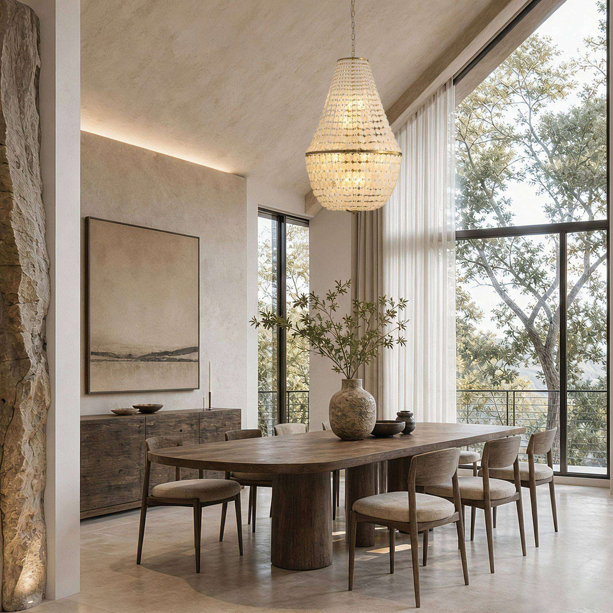 Aeroh Shell Chandelier above dining table — long wood table, upholstered chairs, large window with trees, minimalist decor, warm pearl shell glow | Sofary Lighting