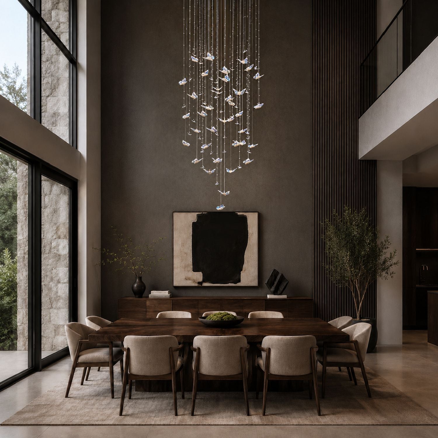 Aerosus K9 Crystal Waterfall Chandelier above a formal dining table with beige upholstered chairs, marble backsplash, and large windows — refined elegance for dinner parties | Sofary Lighting