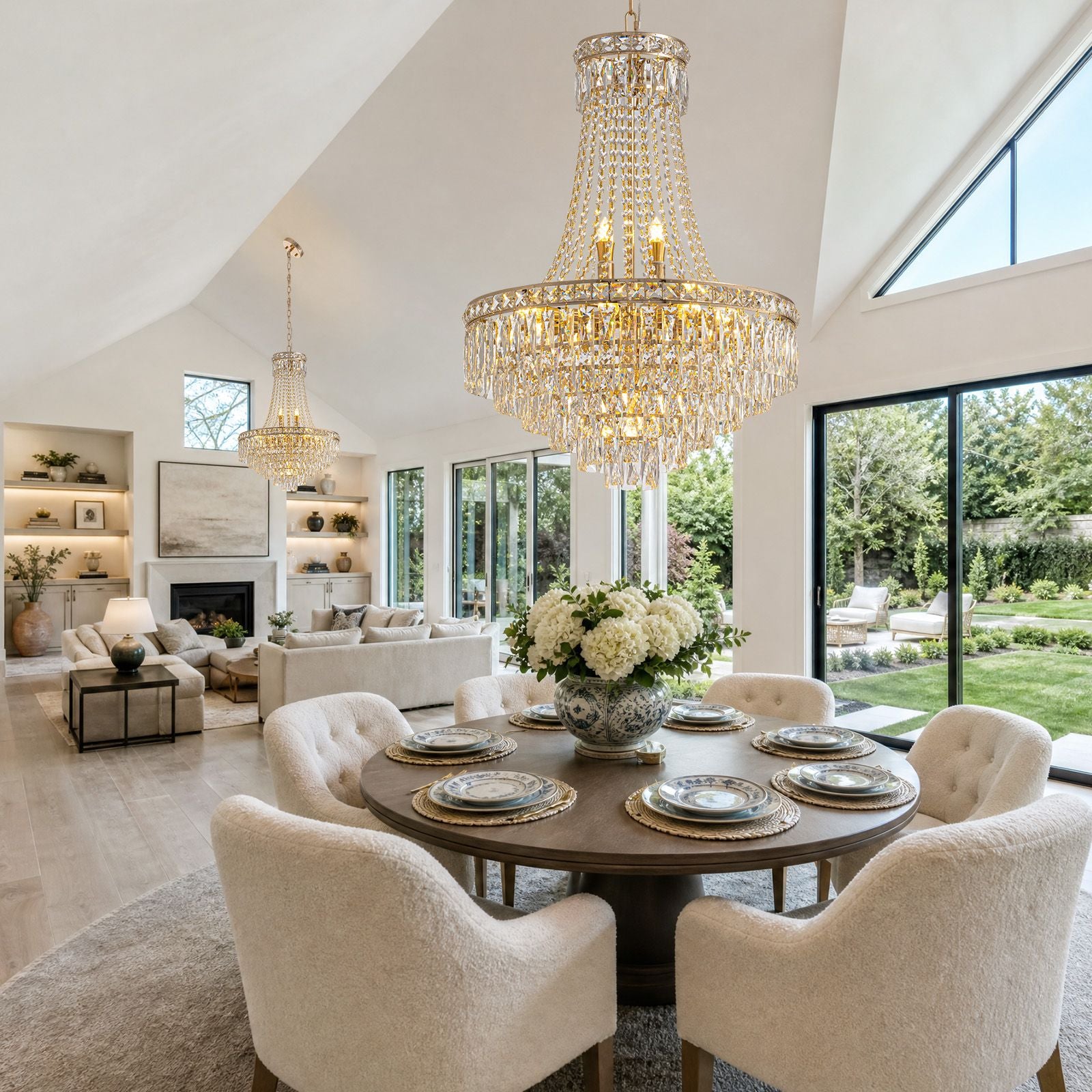 Aerova K9 crystal chandelier above formal dining table — natural light from windows, beige upholstered chairs, centerpiece flowers, elegant dinner party ambiance