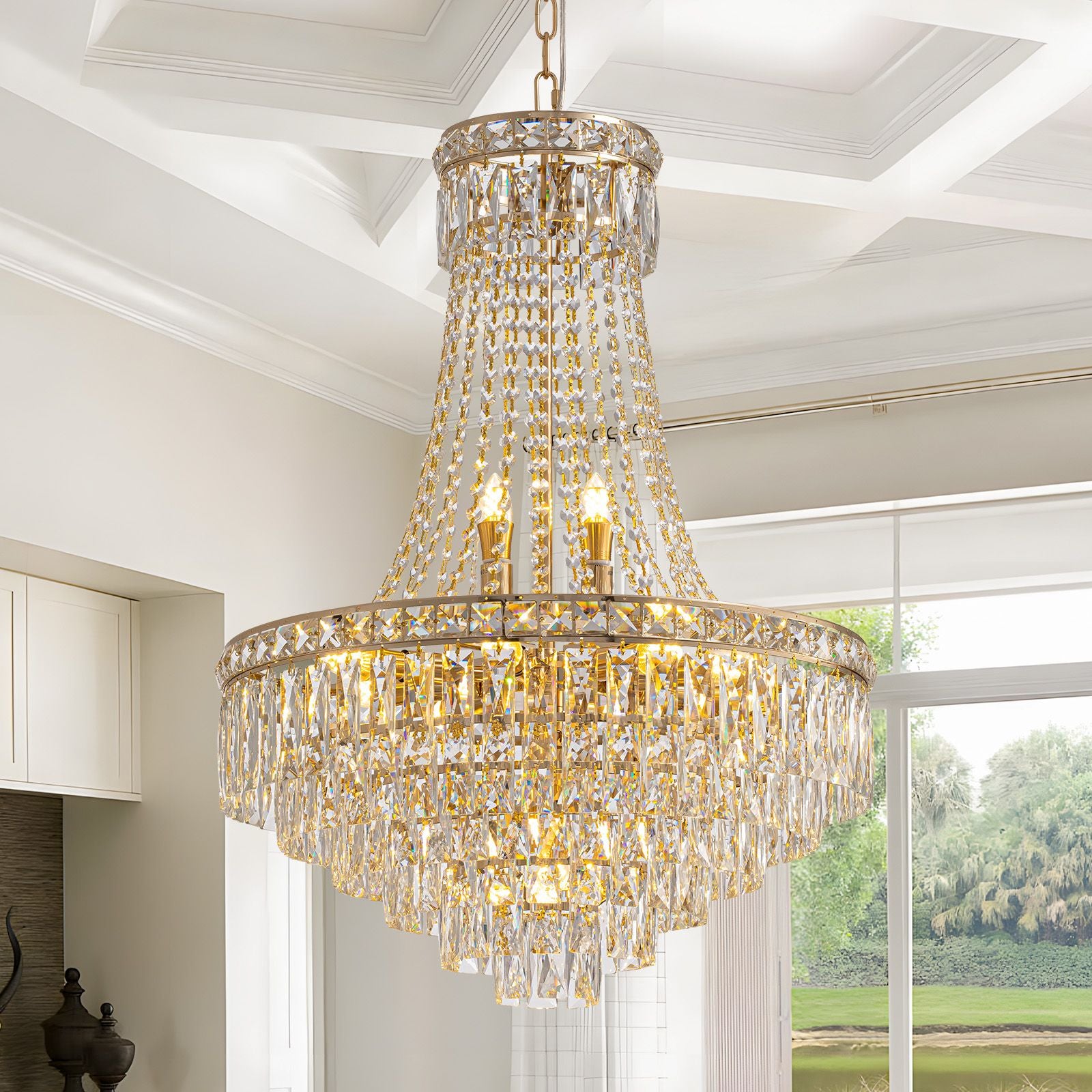 Aerova modern K9 crystal multi-tier chandelier in grand foyer — polished gold finish, cascading prisms, warm ambient glow, luxury entryway statement piece
