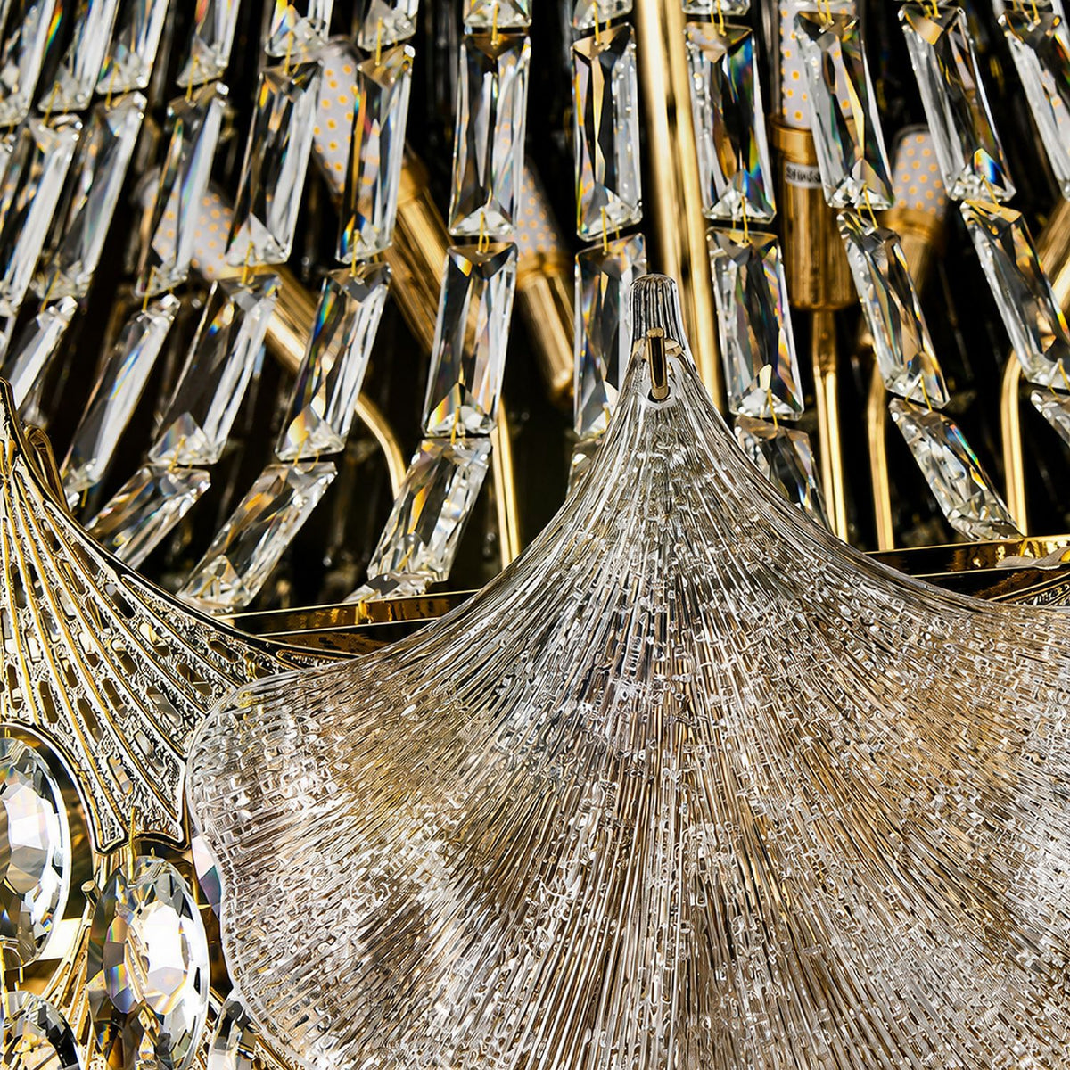 Close-up of Aerux Chandelier crystal canopy — densely faceted K9 crystal tier, precision cut radial pattern, light refraction and rainbow dispersion | Sofary Lighting