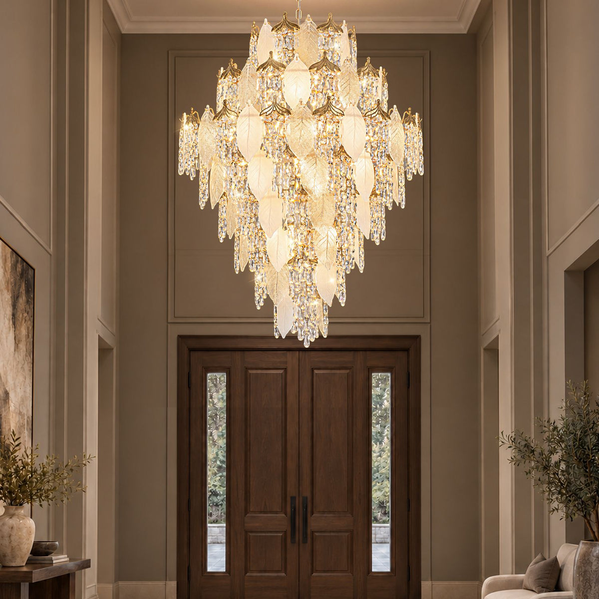 Aevum Grand Cascading Gold K9 Crystal Chandelier in luxury foyer — double-height ceiling, dark wood double doors, cascading gold leaf and K9 crystal tiers, warm glow, modern villa entryway | Sofary Lighting