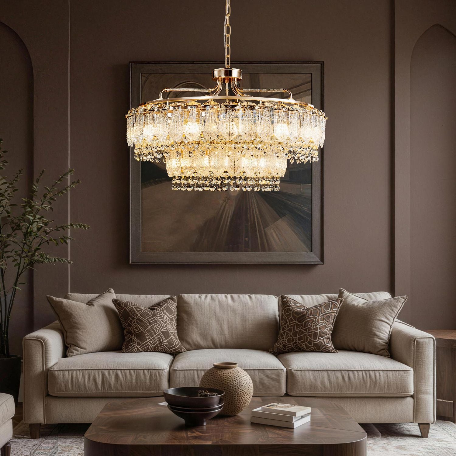 Astro Italian Mid-Century Modern Chrome Stainless Steel Double Tiered Satellite Chandelier enhances a living room with a brown leather sofa, floor lamp, and lush plants, creating a cozy mid-century vibe | Sofary Lighting