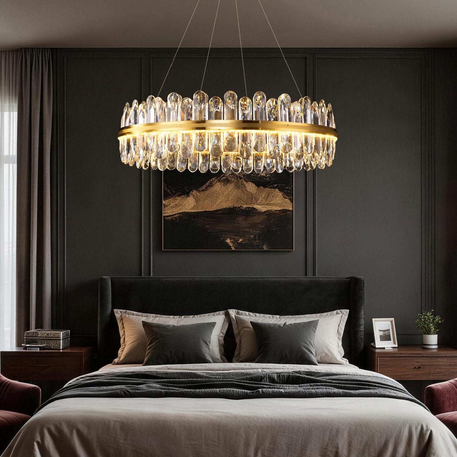 Aurelia Modern Luxury Champagne Gold K9 Crystal Chandelier in a bedroom — suspended above a bed with brown bedding, beige headboard, and dark wood nightstands | Sofary Lighting