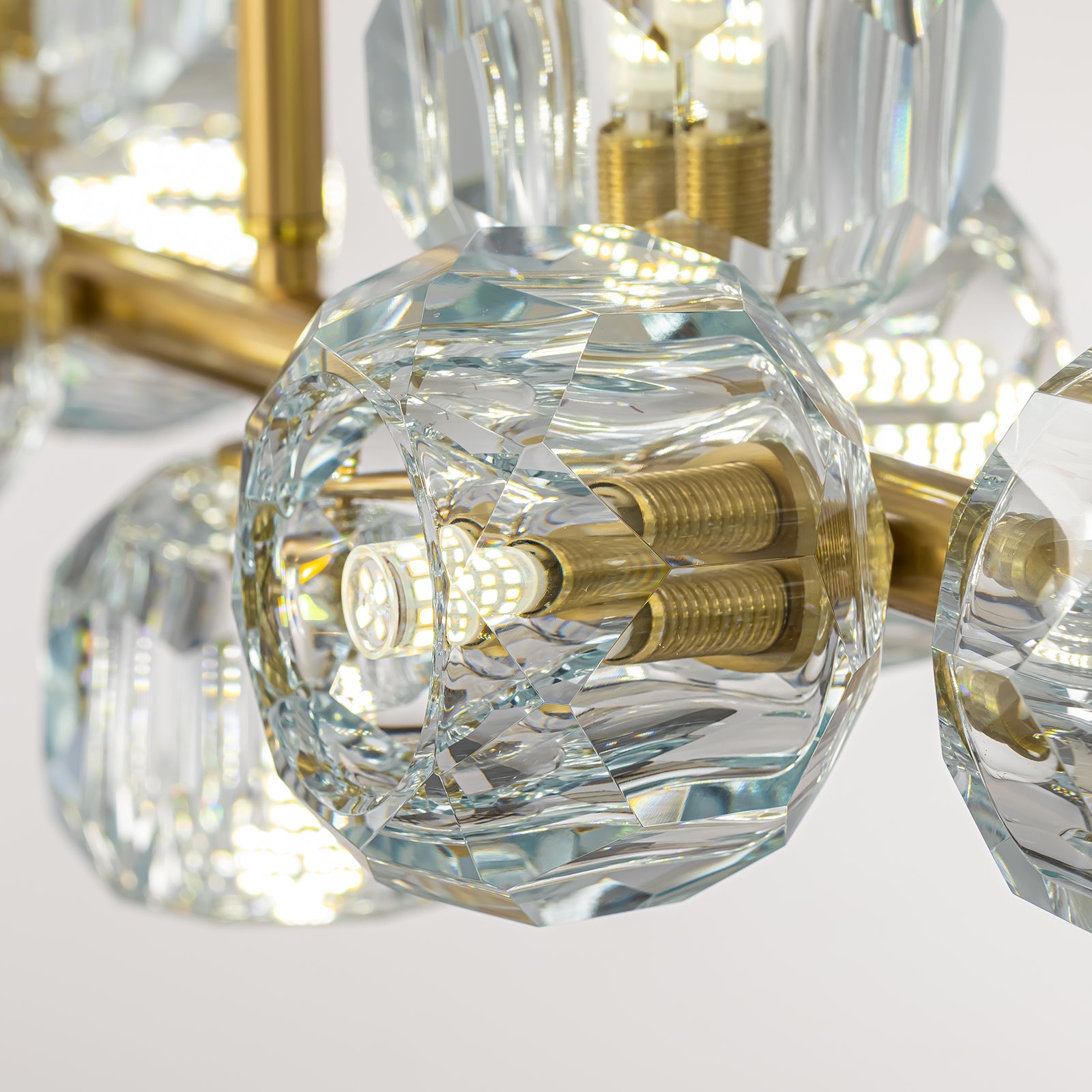 aurielle-contemporary-gold-crystal-linear-multi-head-chandelier-details-of-lights-with-white-background-CH618-A-sofary-20260427