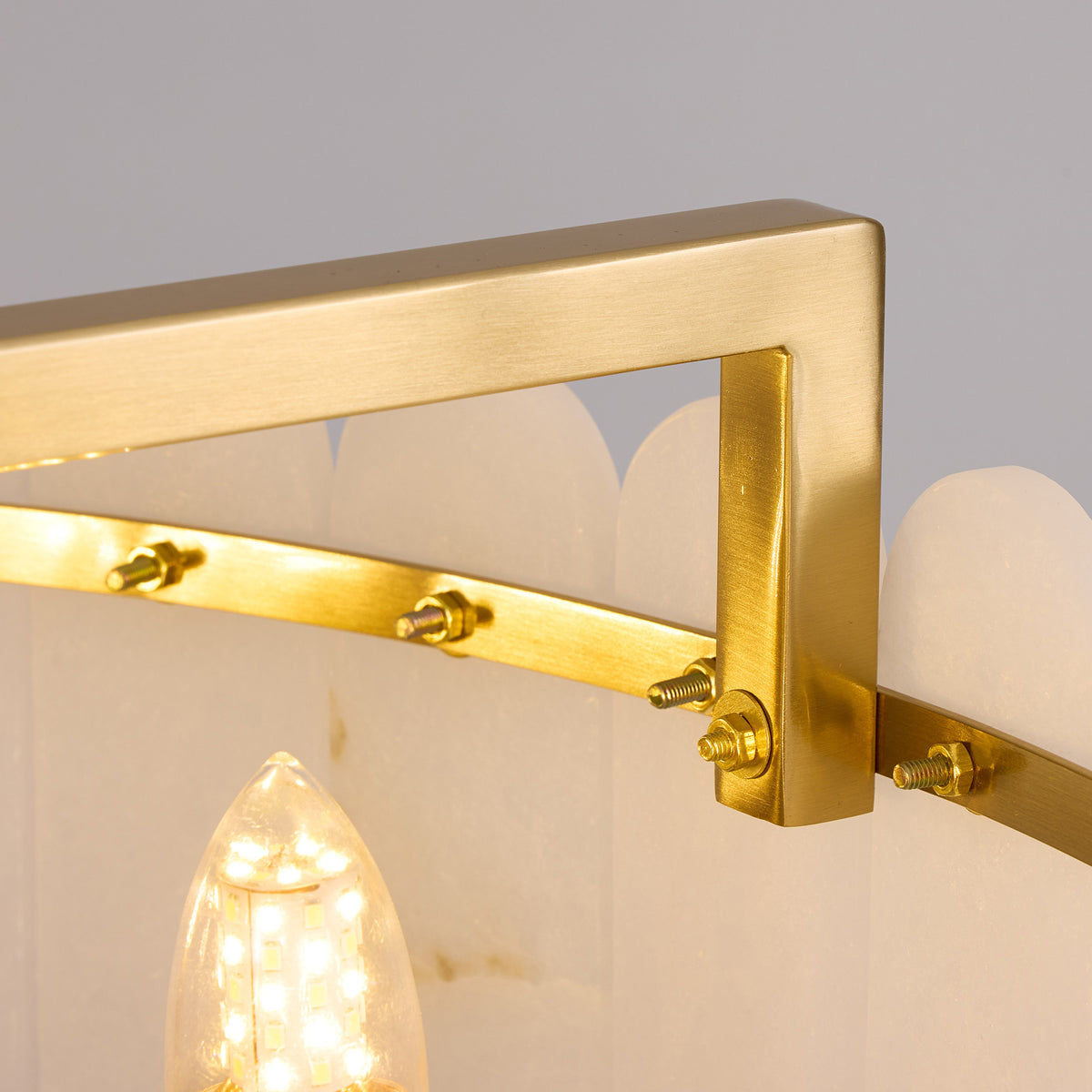 caldria-modern-luxury-alabaster-round-drum-chandelier-details-of-frame-sofary-lighting