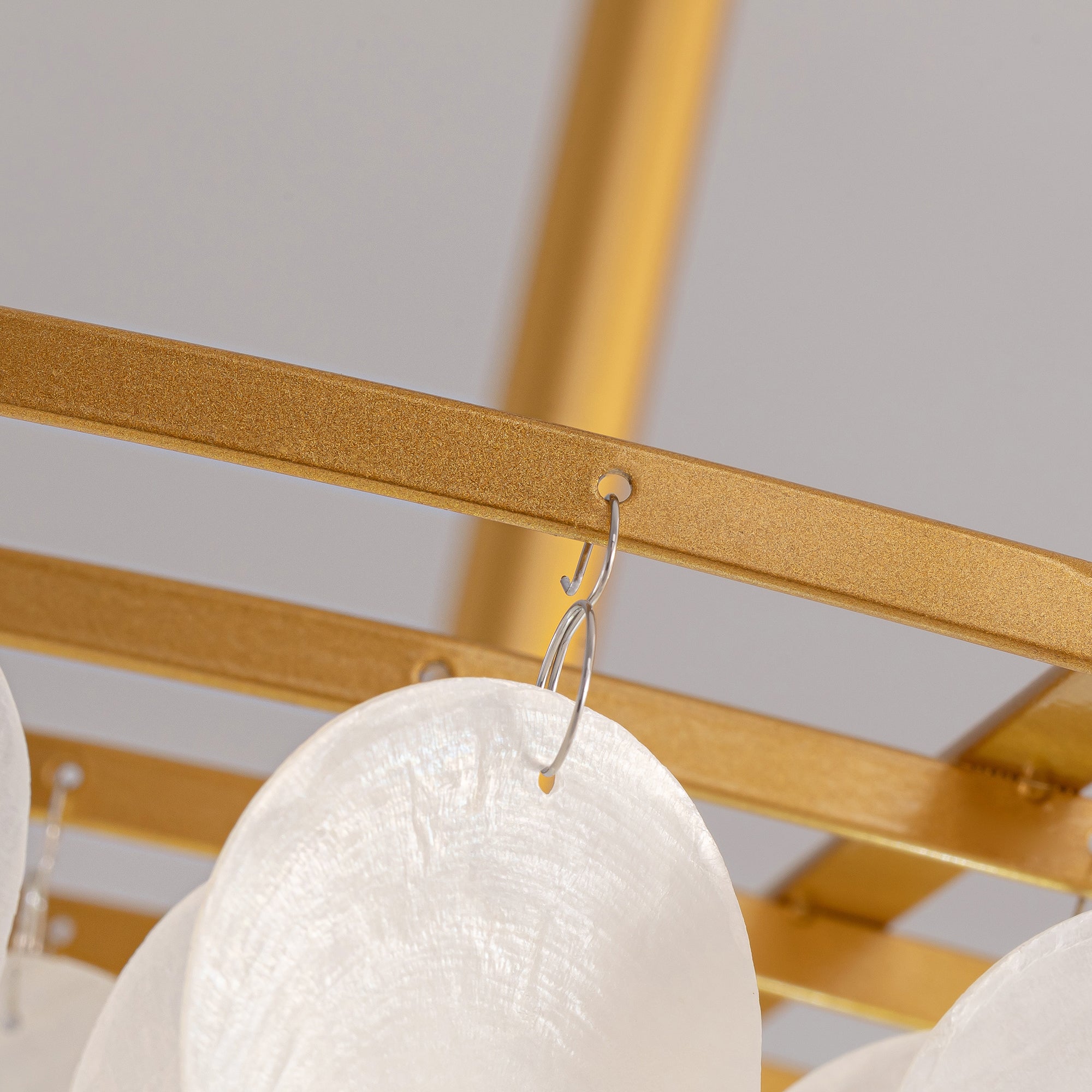 calista-coastal-gold-shell-tiered-disc-chandelier-details-of-frame-sofary-lighting